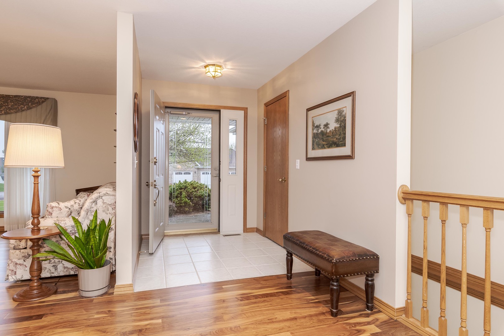 103 East 9th Street Gridley, IL 61744 - Photo 2 of 45 a view of a livingroom with furniture and a potted plant