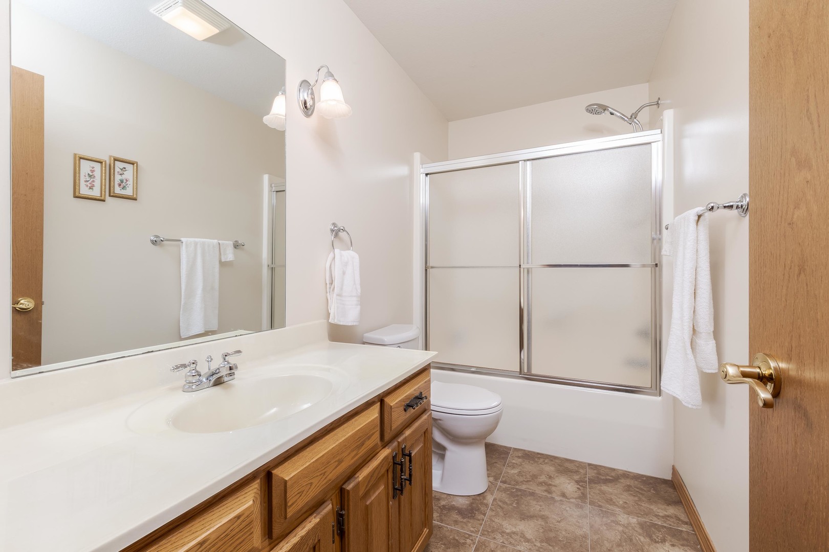 103 East 9th Street Gridley, IL 61744 - Photo 22 of 45 a bathroom with a sink toilet and shower