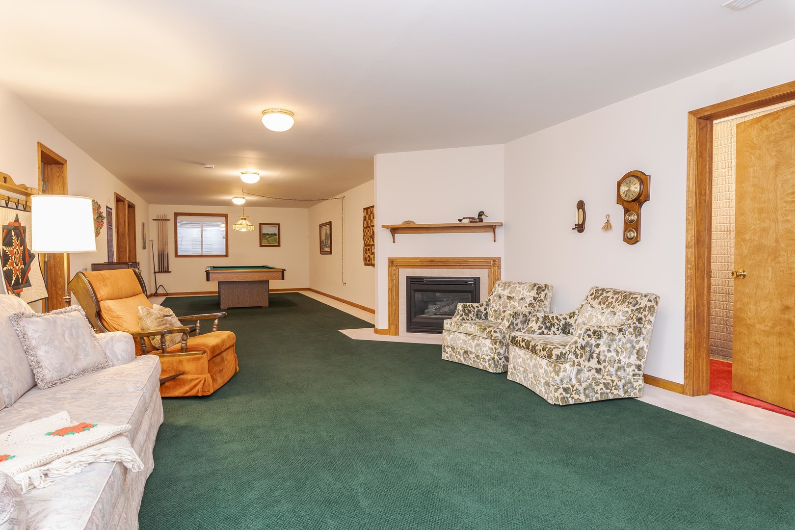 103 East 9th Street Gridley, IL 61744 - Photo 28 of 45 a living room with furniture and a fireplace
