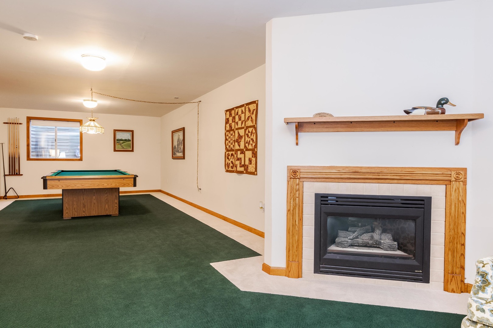 103 East 9th Street Gridley, IL 61744 - Photo 30 of 45 a living room with furniture and a fireplace