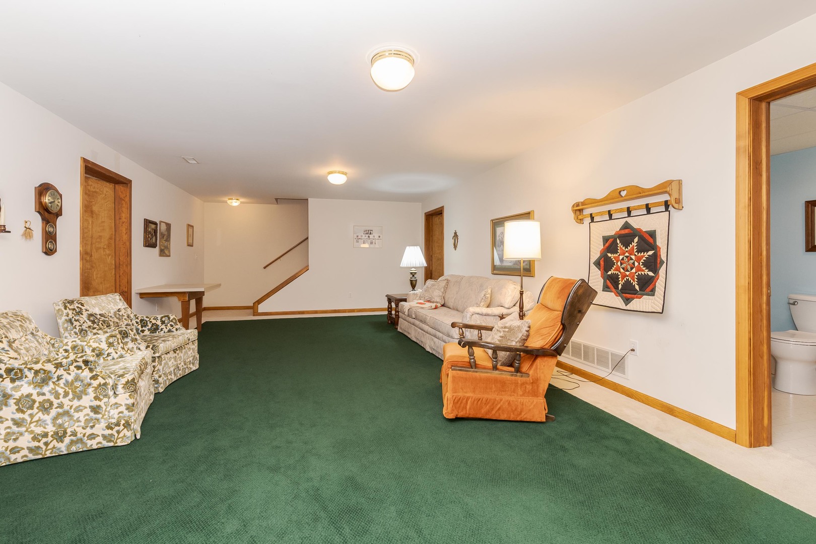 103 East 9th Street Gridley, IL 61744 - Photo 31 of 45 a living room with furniture and a flat screen tv