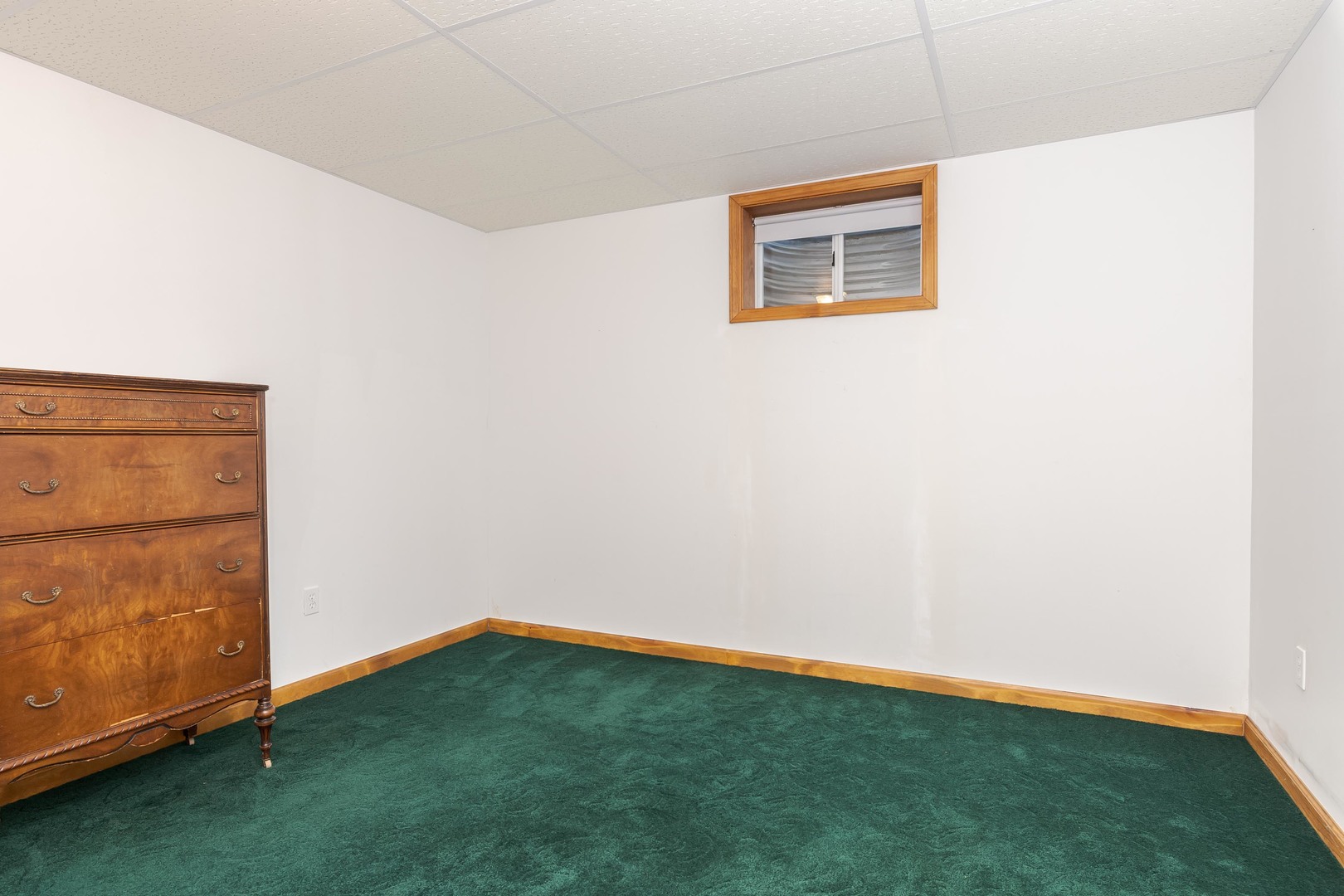 103 East 9th Street Gridley, IL 61744 - Photo 34 of 45 an empty room with a workbench