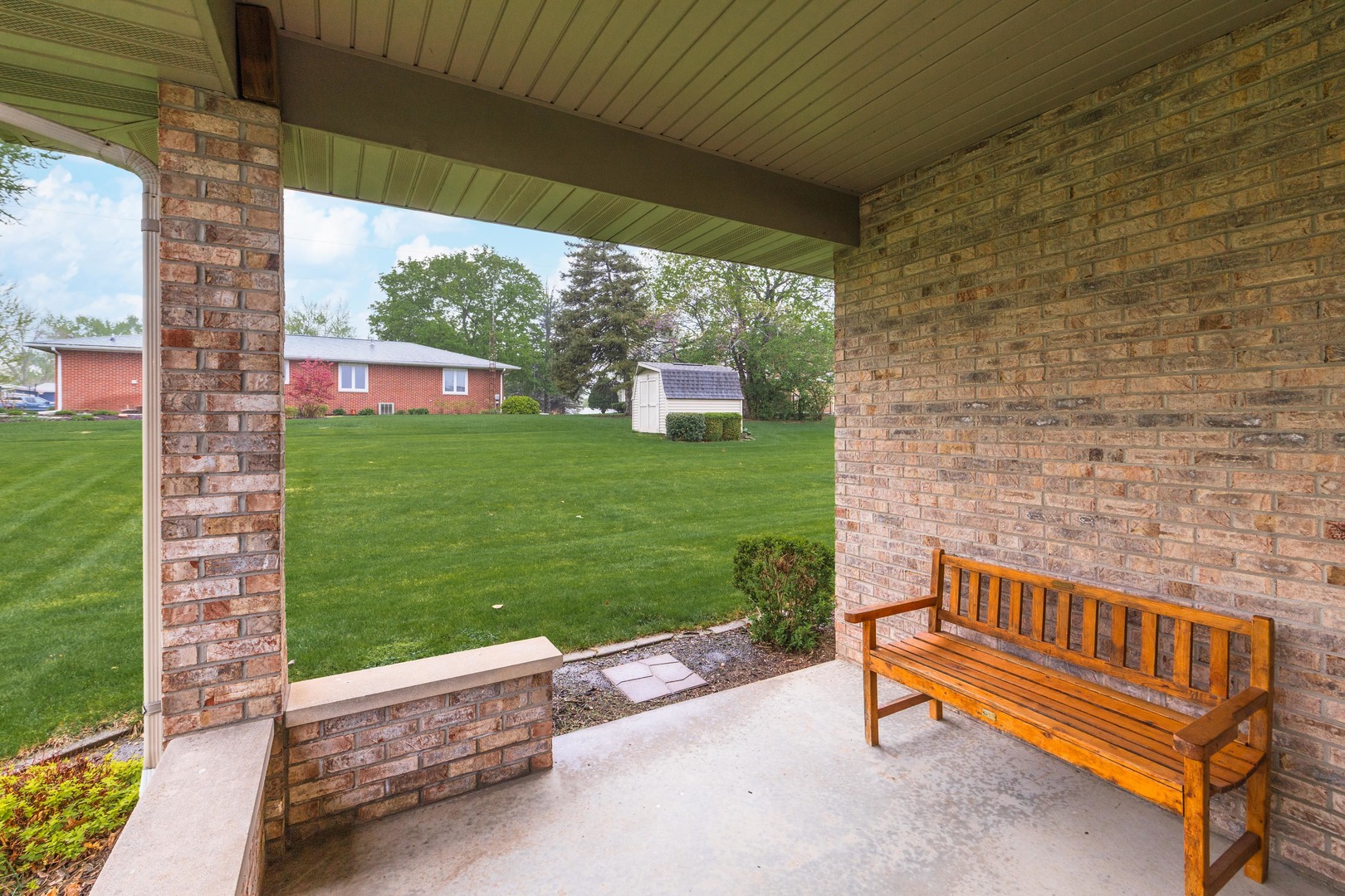 103 East 9th Street Gridley, IL 61744 - Photo 41 of 45 a view of a two chairs in the patio with a yard