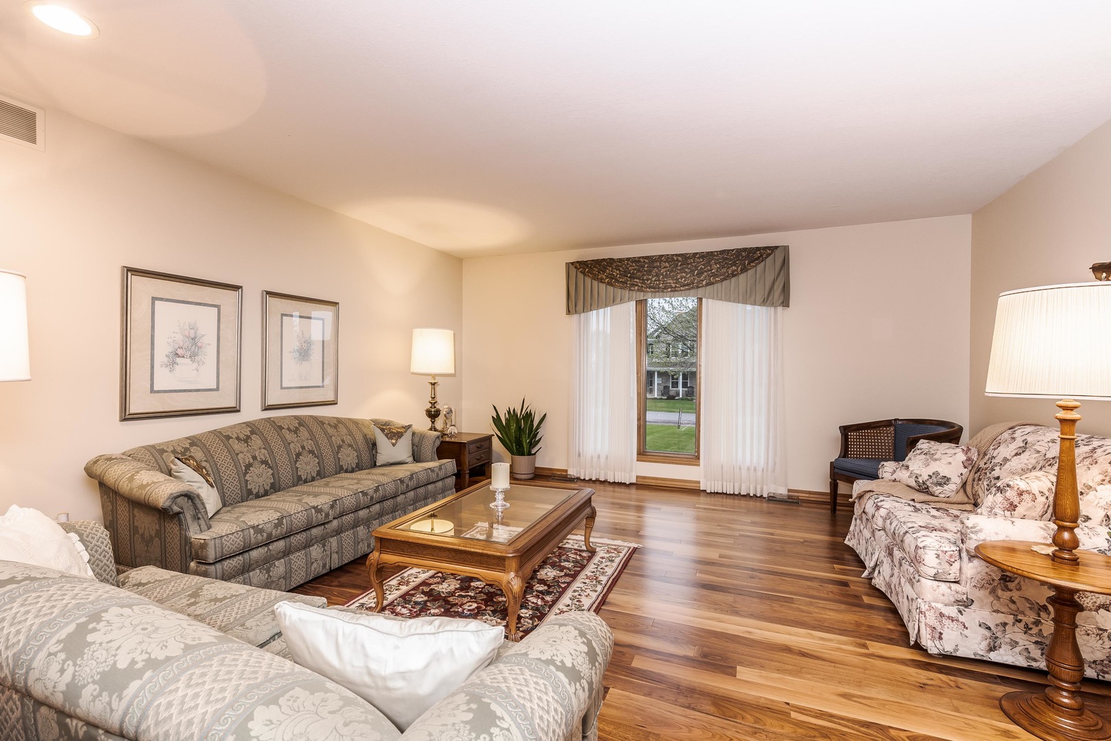 103 East 9th Street Gridley, IL 61744 - Photo 5 of 45 a living room with furniture and a wooden floor
