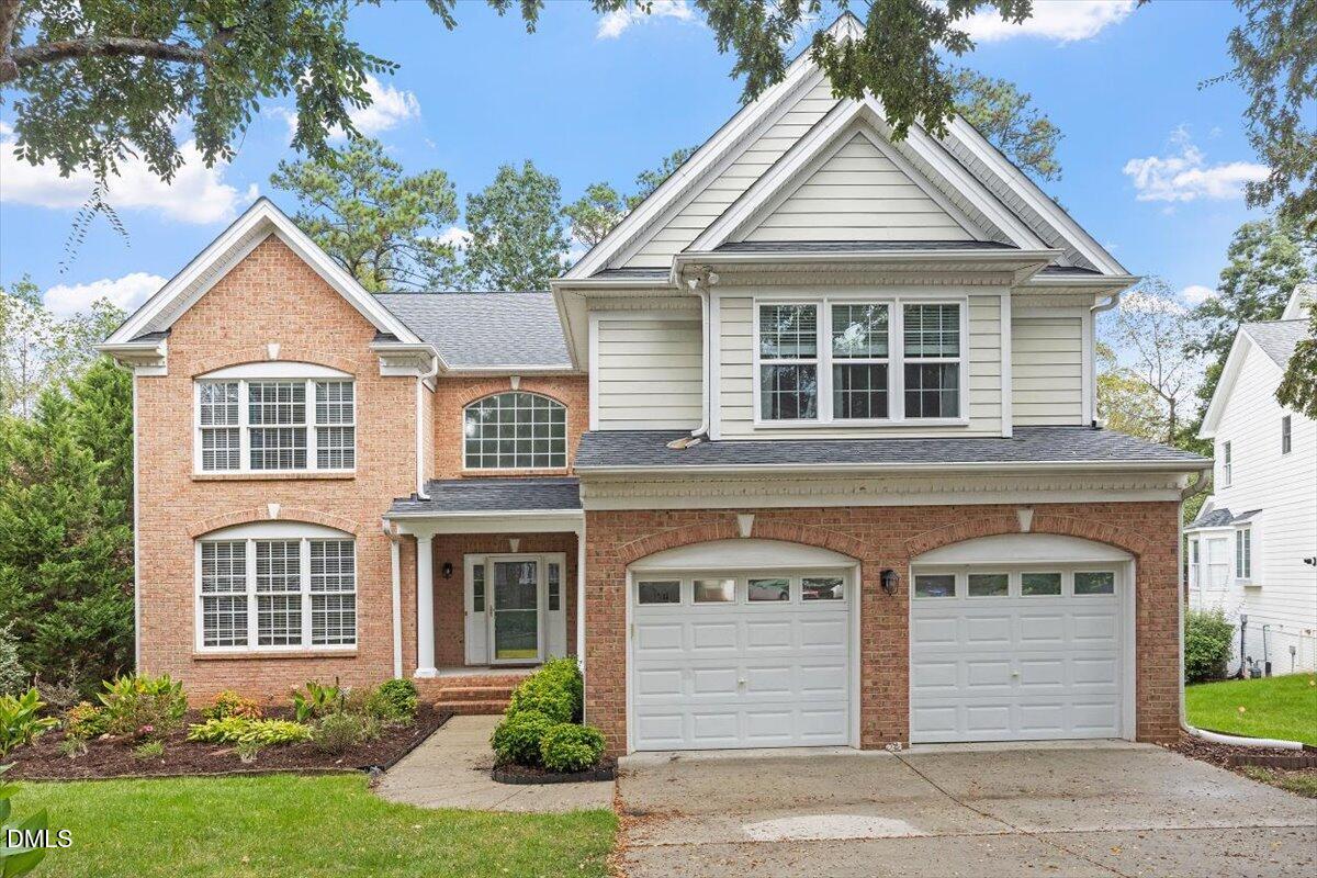 9208 Palm Bay Circle Raleigh, NC 27617 - Photo 1 of 54 front view of a house and a yard