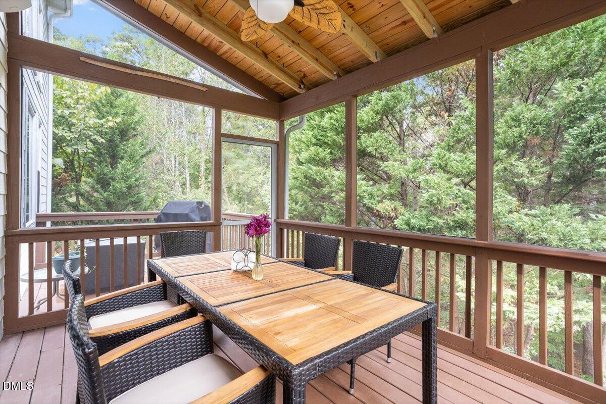 9208 Palm Bay Circle Raleigh, NC 27617 - Photo 21 of 54 a view of a balcony with furniture and wooden floor
