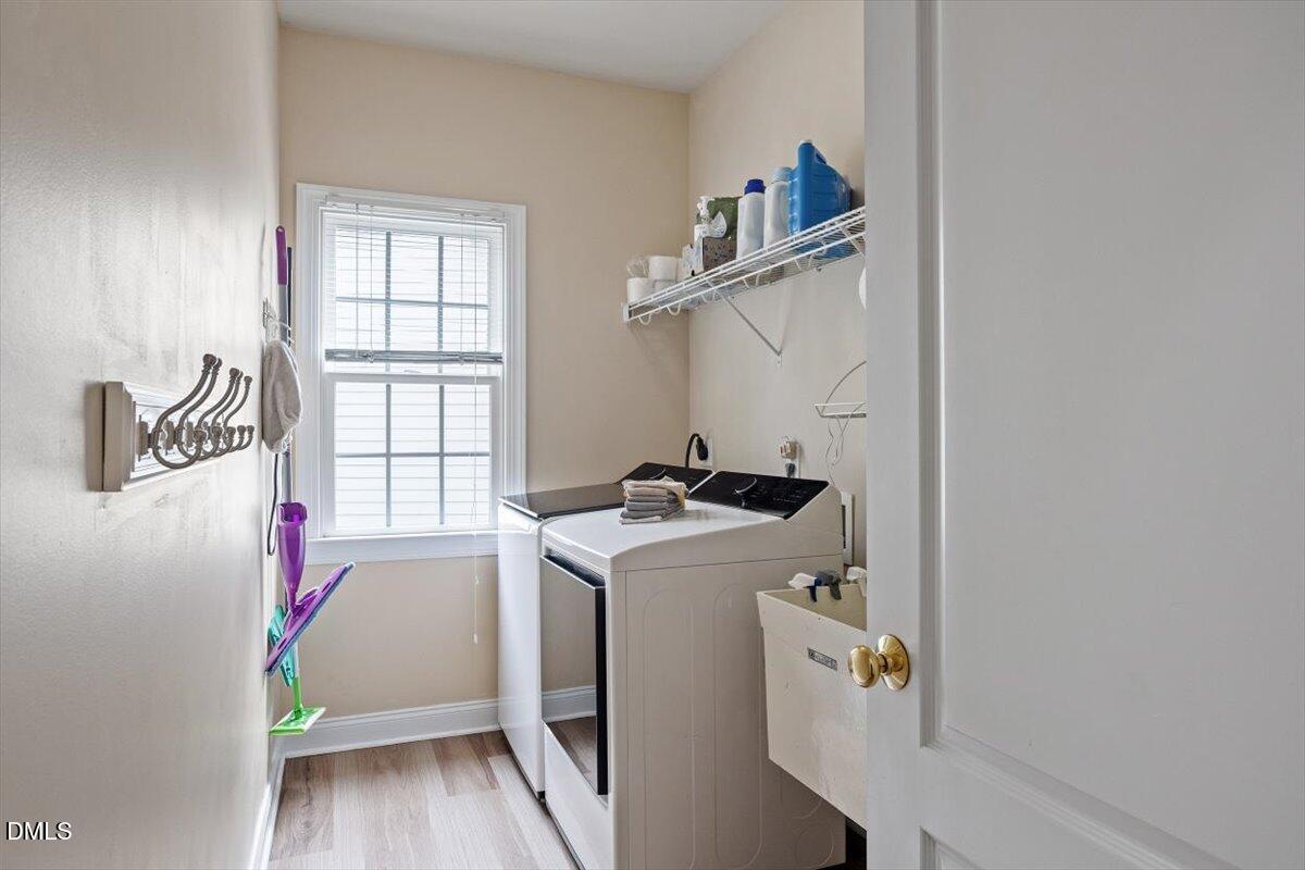 9208 Palm Bay Circle Raleigh, NC 27617 - Photo 29 of 54 a utility room with dryer and washer