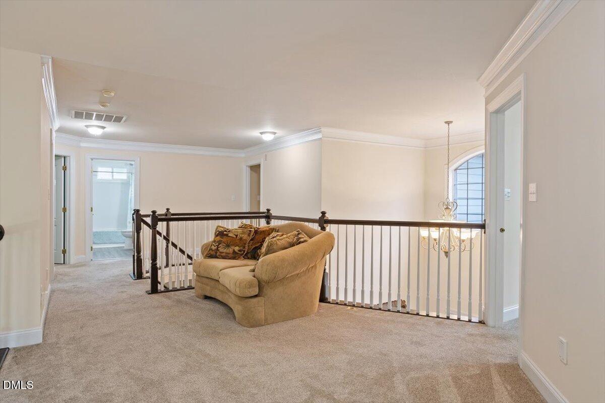 9208 Palm Bay Circle Raleigh, NC 27617 - Photo 45 of 54 a view of staircase with white walls