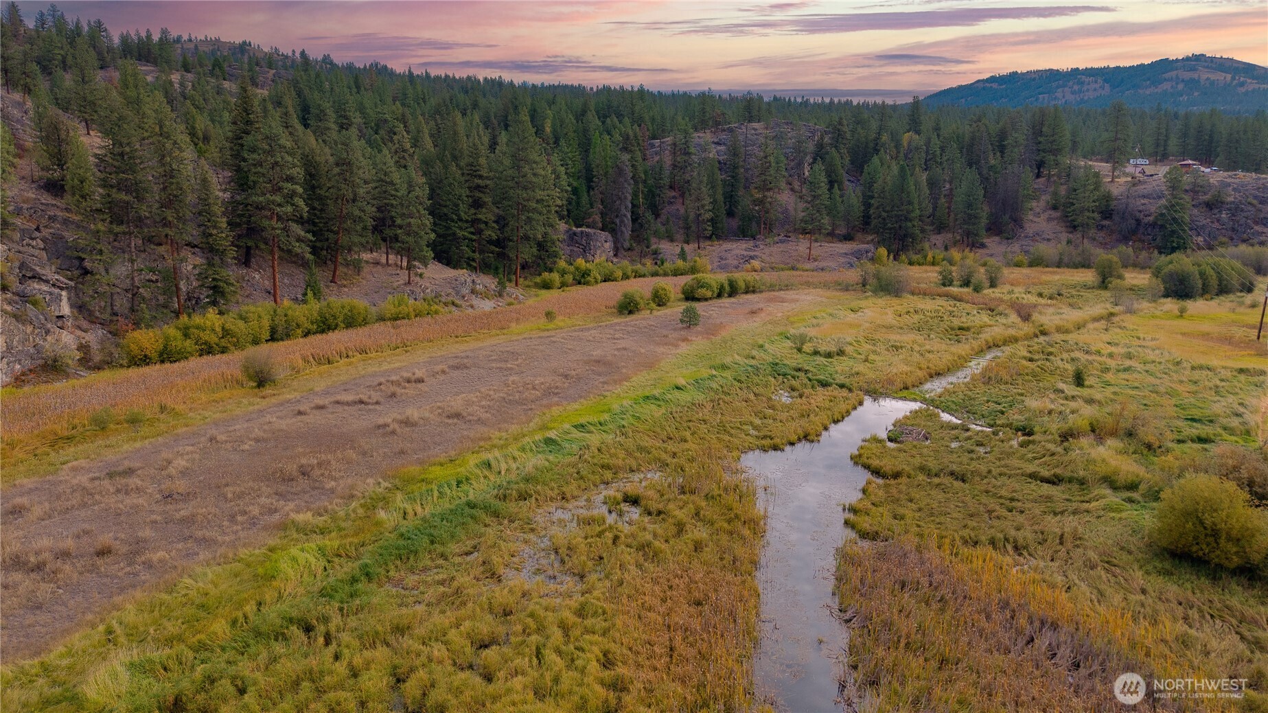 0 Eaglestone Road Tonasket, WA 98855 - Photo 2 of 40 a view of a backyard with green space