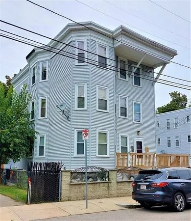 a car parked in front of a building