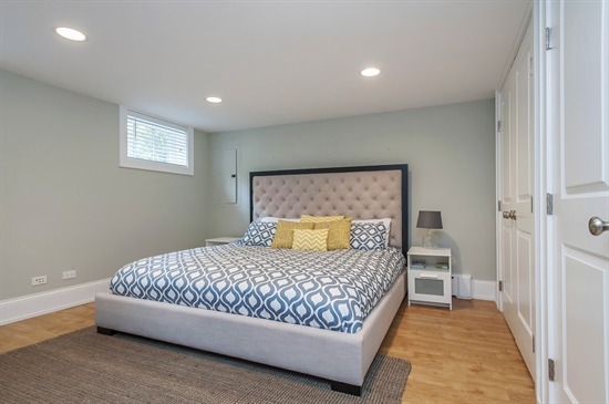 393 Sunset Road Winnetka, IL 60093 - Photo 14 of 15 a bedroom with a bed and a table