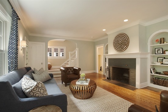 393 Sunset Road Winnetka, IL 60093 - Photo 3 of 15 a living room with furniture and a fireplace