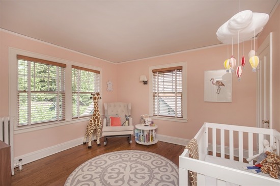 393 Sunset Road Winnetka, IL 60093 - Photo 10 of 15 a bedroom with furniture and a window