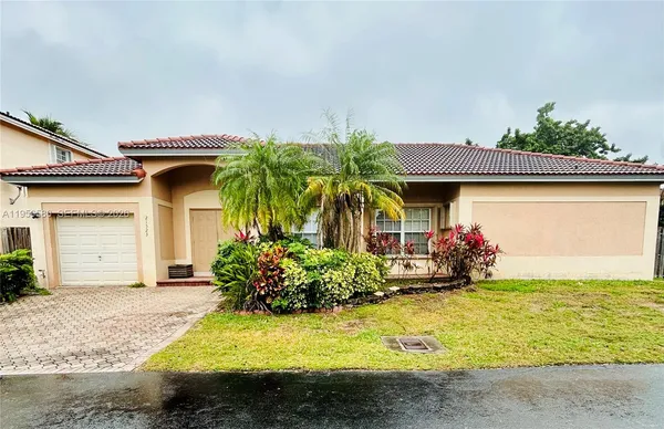 a front view of house with yard