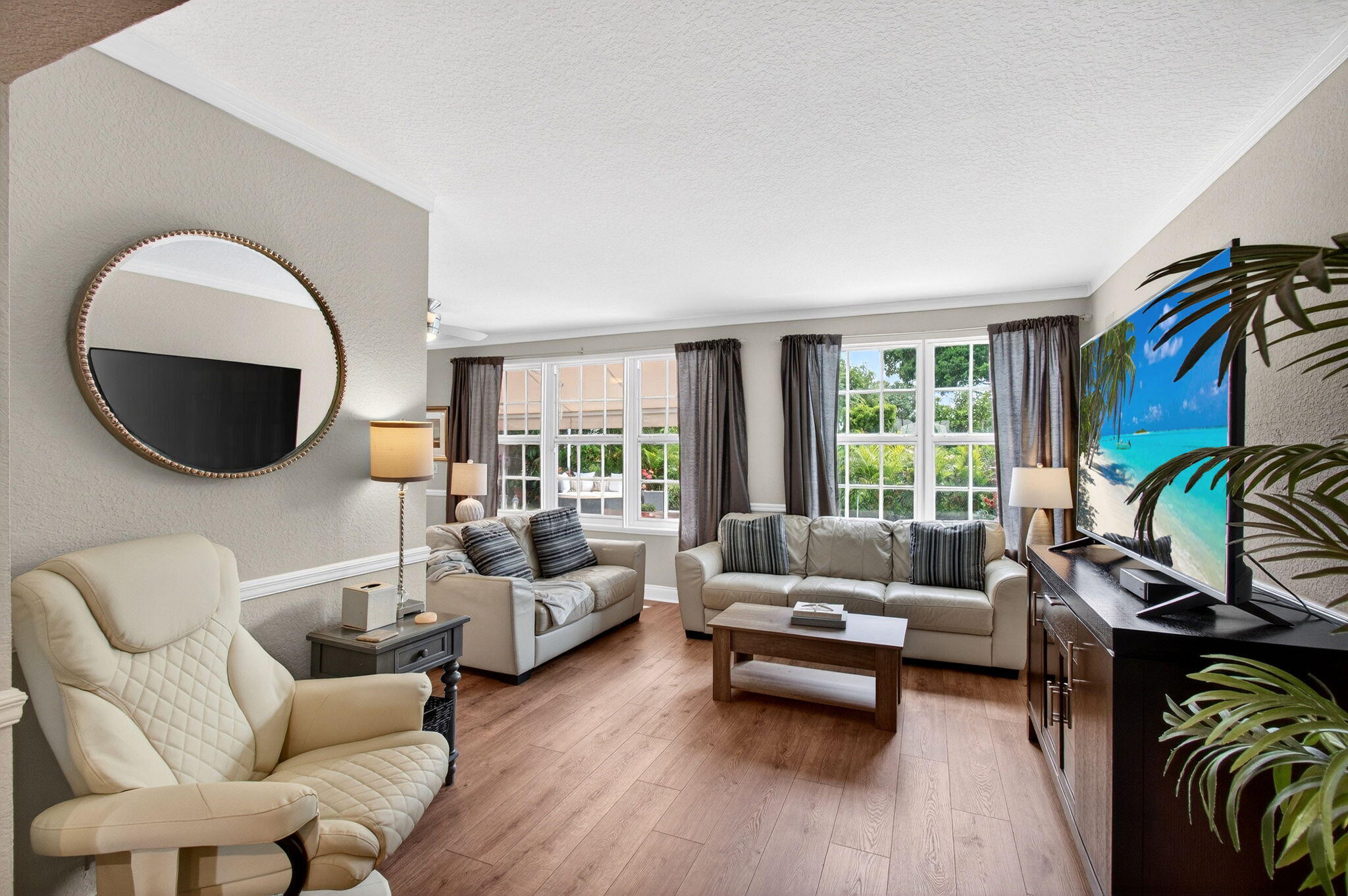 780 Elm Tree Lane Boca Raton, FL 33486 - Photo 25 of 96 a living room with furniture and a large window