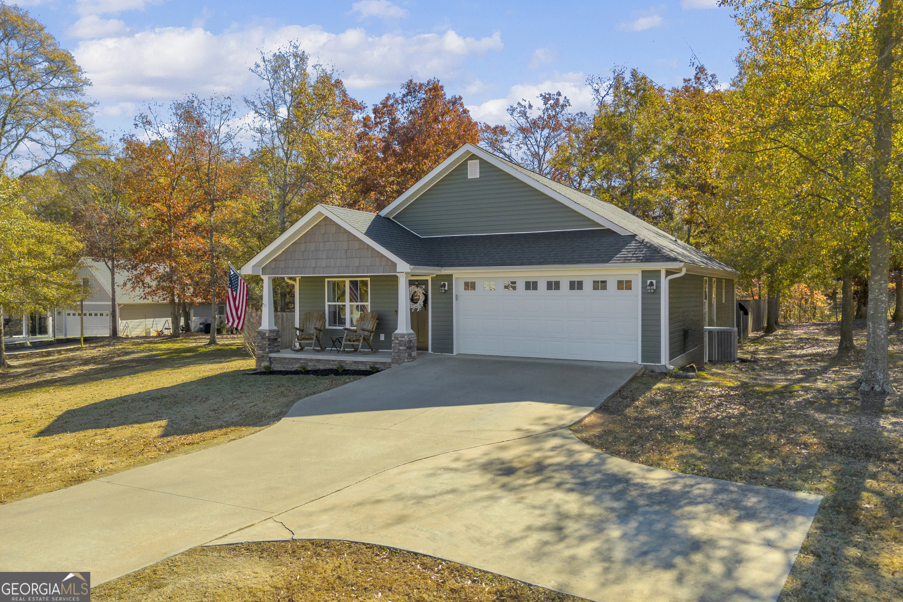 323 North Point Circle Hartwell, GA 30643 - Photo 1 of 42 a front view of a house with a yard