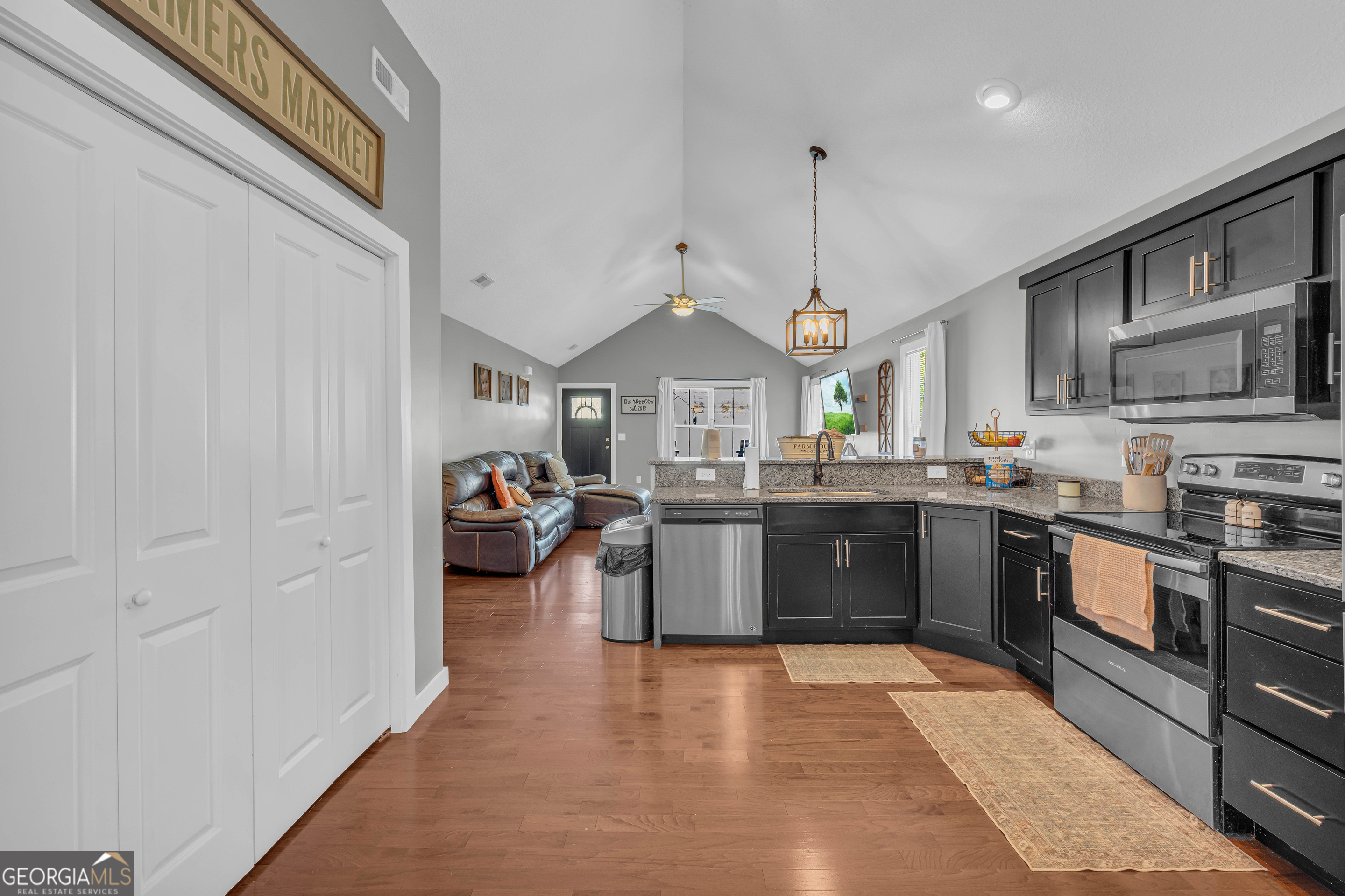 323 North Point Circle Hartwell, GA 30643 - Photo 15 of 42 a kitchen with stainless steel appliances granite countertop a sink and cabinets