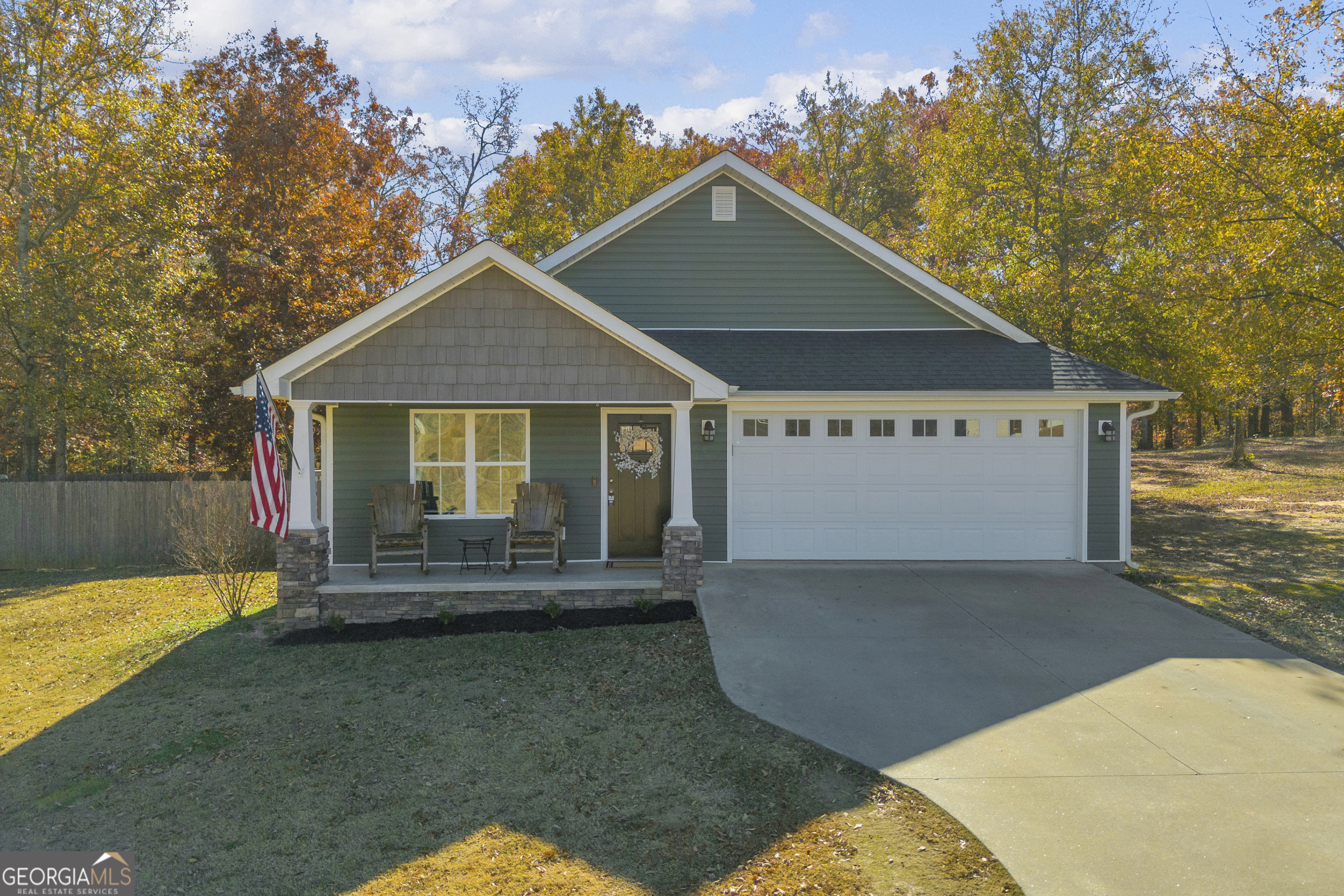 323 North Point Circle Hartwell, GA 30643 - Photo 2 of 42 a front view of a house with a yard