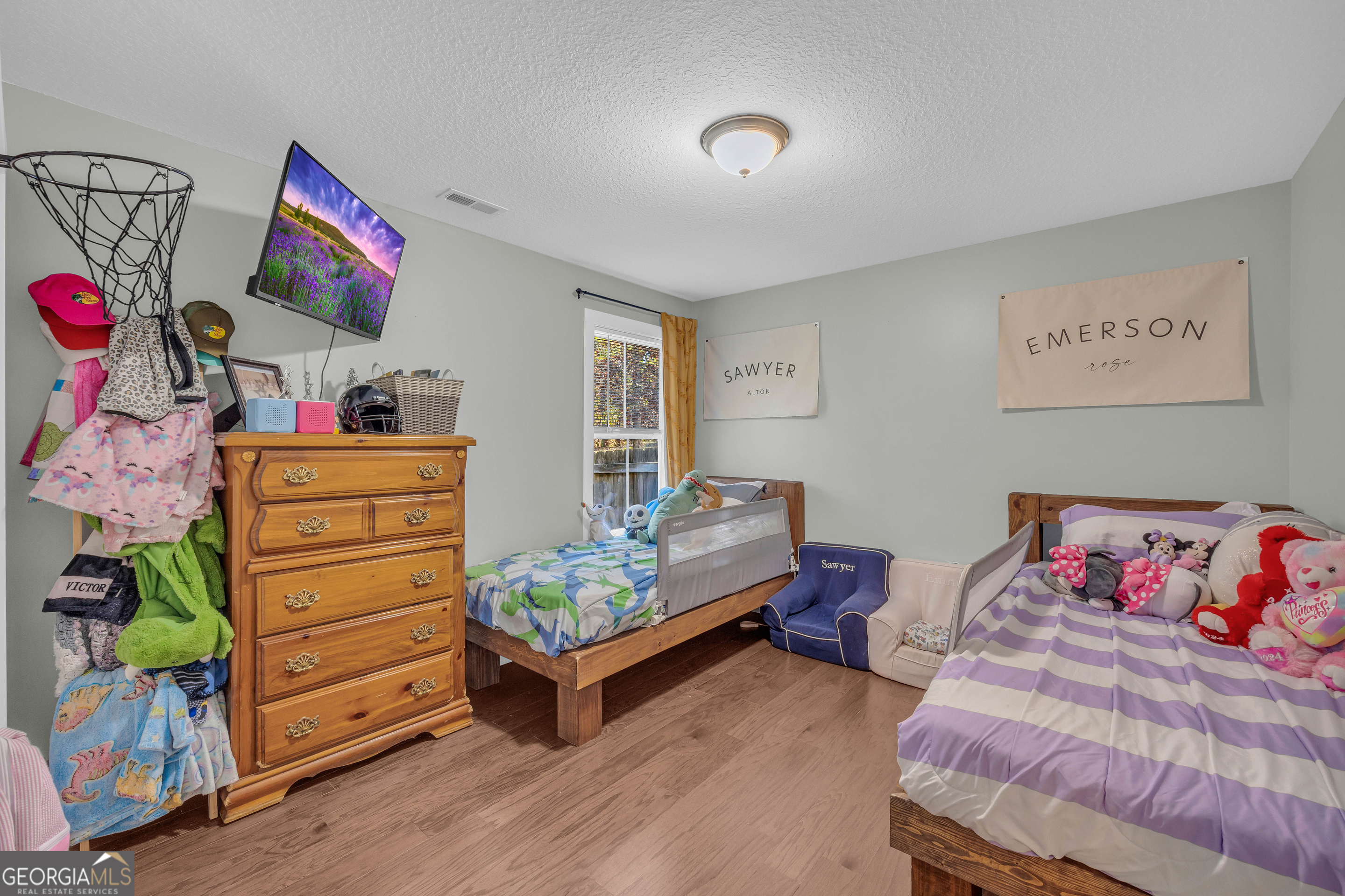 323 North Point Circle Hartwell, GA 30643 - Photo 23 of 42 a bedroom with a bed and furniture