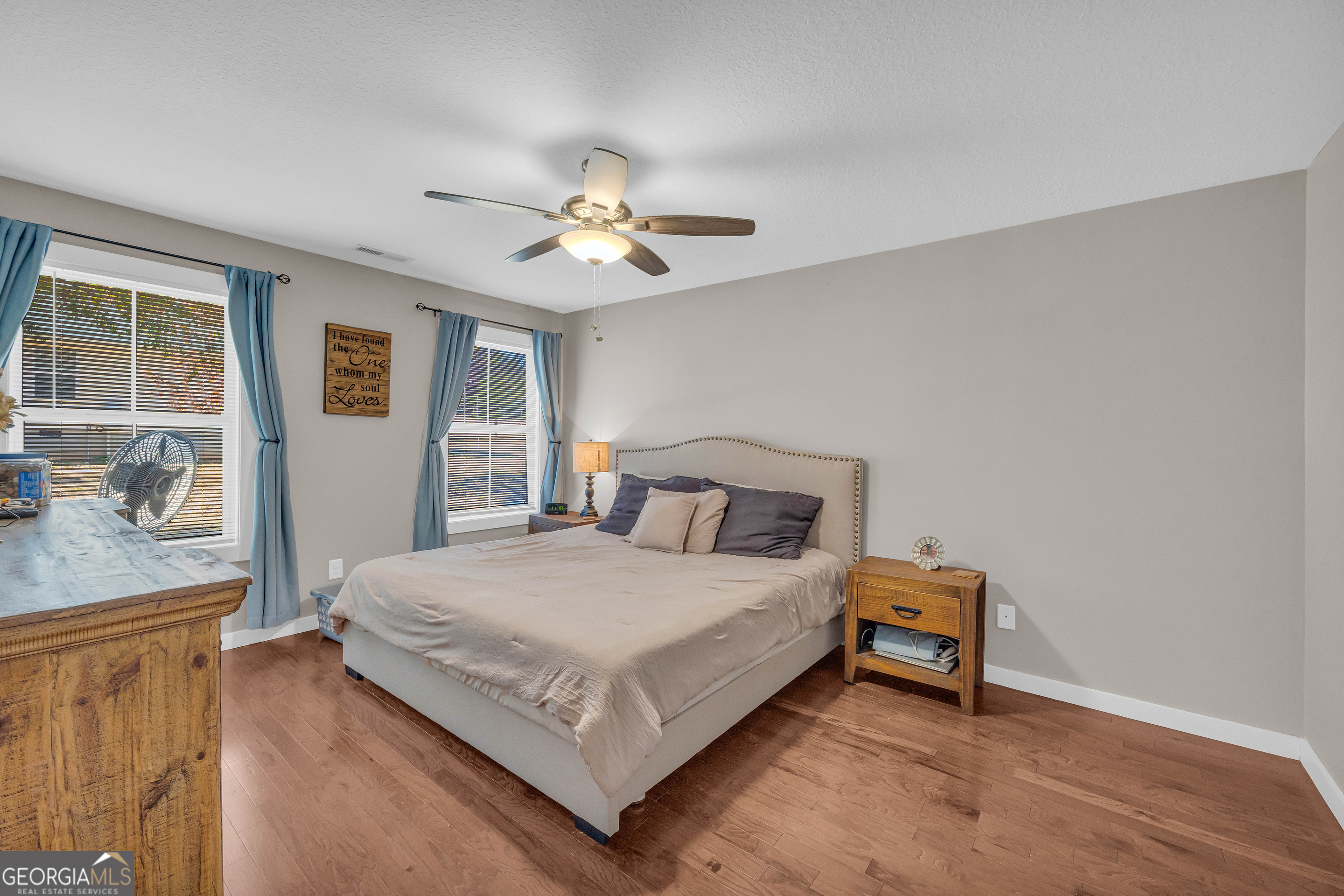 323 North Point Circle Hartwell, GA 30643 - Photo 27 of 42 a bedroom with a bed dresser and a window