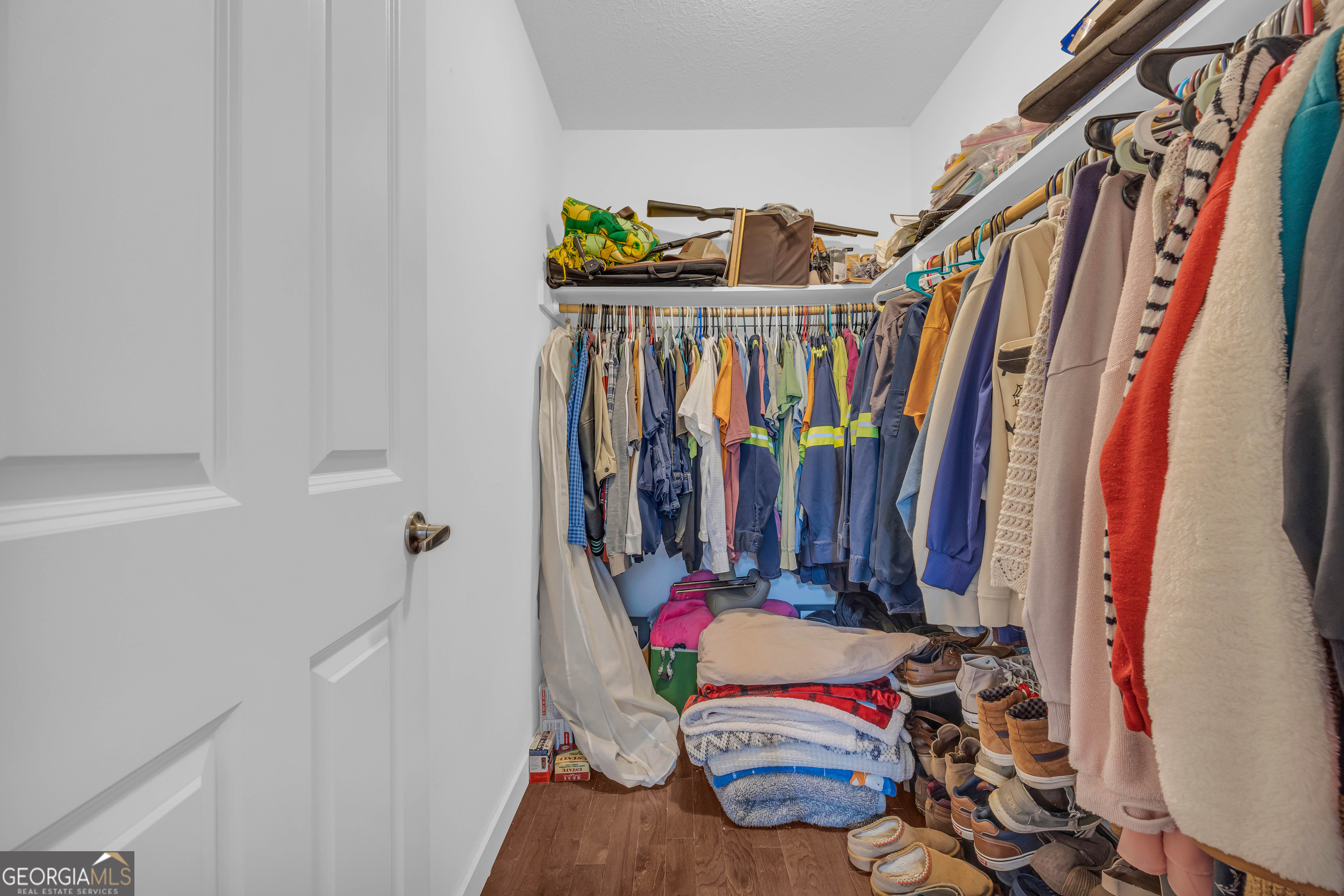 323 North Point Circle Hartwell, GA 30643 - Photo 31 of 42 a view of walk in closet with clothes
