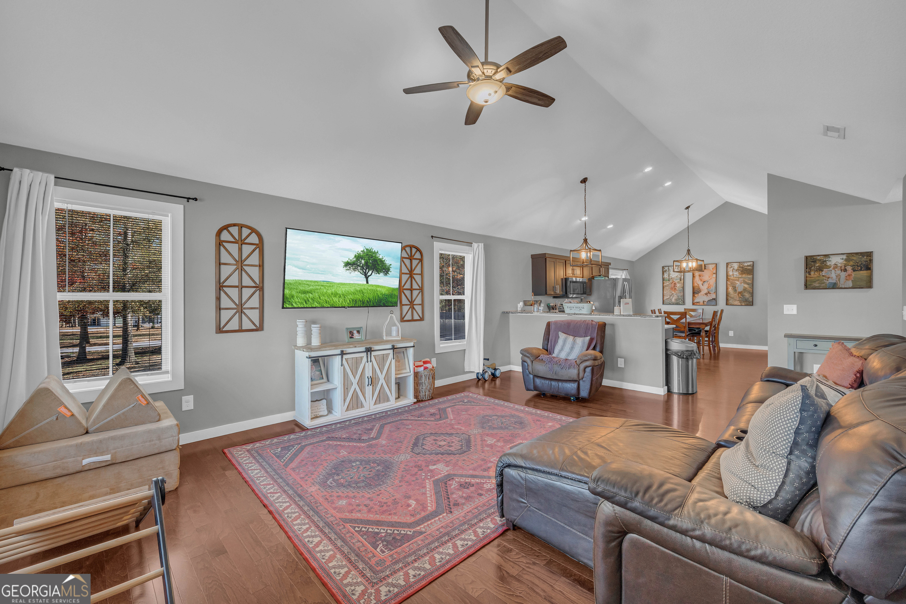 323 North Point Circle Hartwell, GA 30643 - Photo 9 of 42 a living room with furniture and a flat screen tv