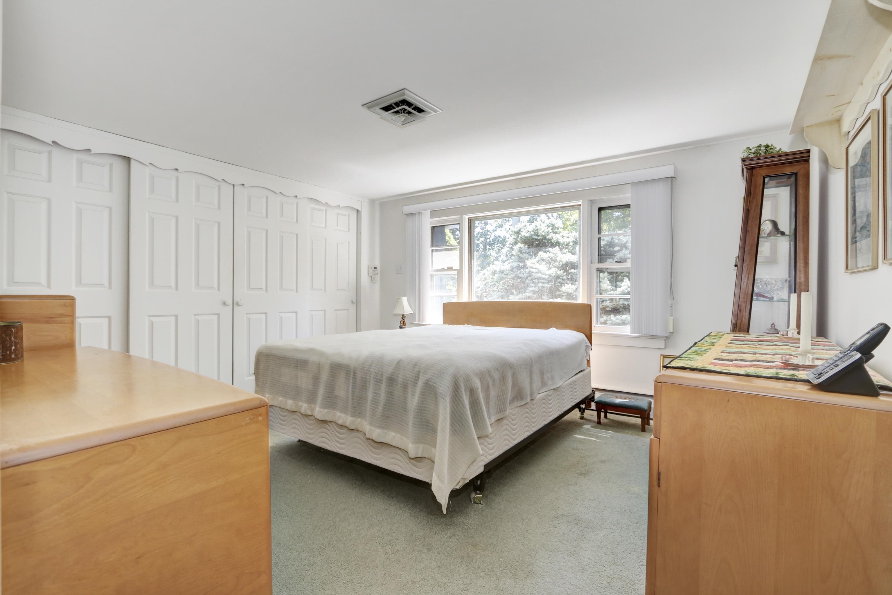 12 West Cedar Avenue Rio Grande, NJ 08242 - Photo 15 of 40 a bedroom with a bed and a table