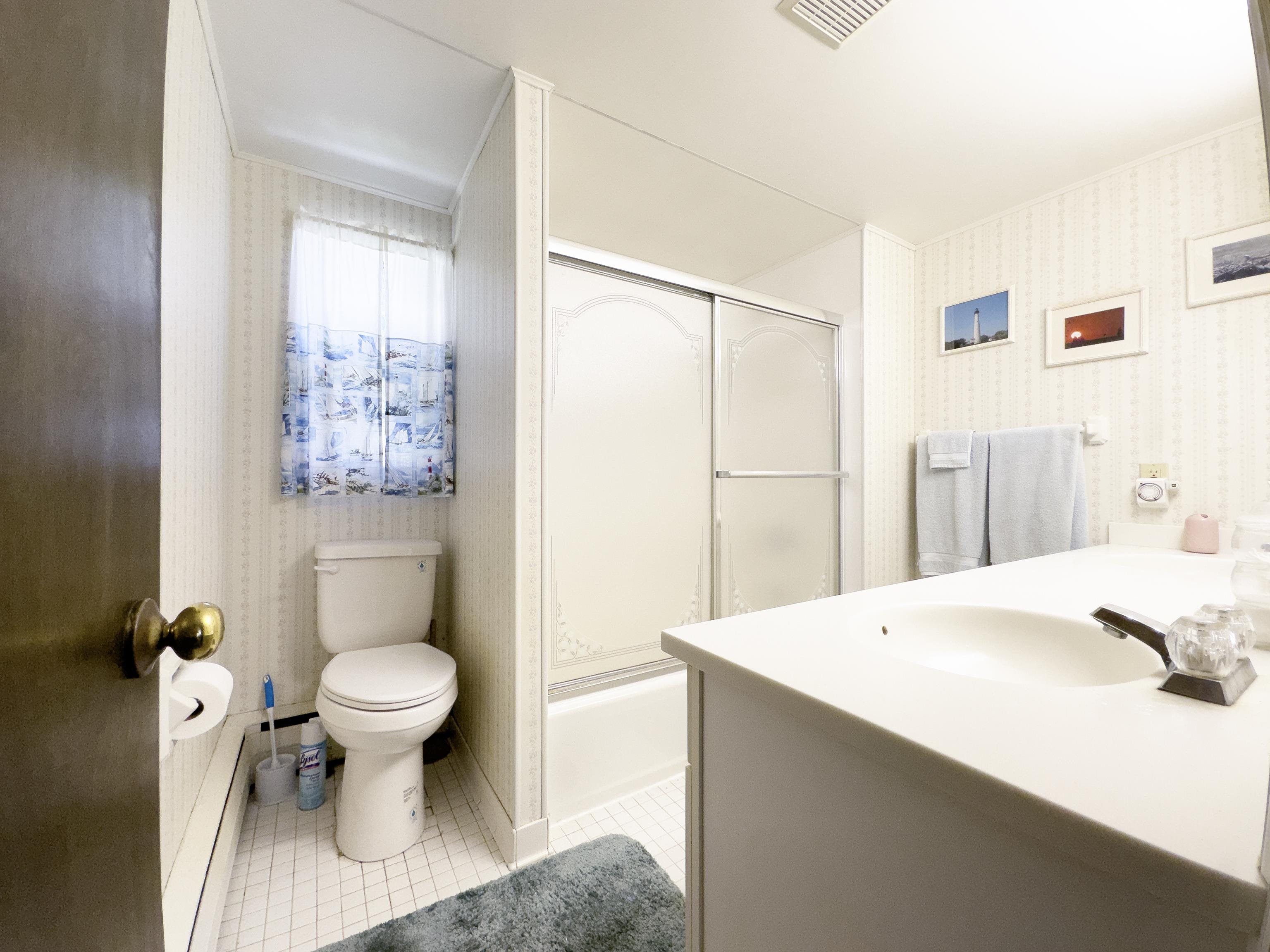 12 West Cedar Avenue Rio Grande, NJ 08242 - Photo 18 of 40 a bathroom with a sink toilet and shower