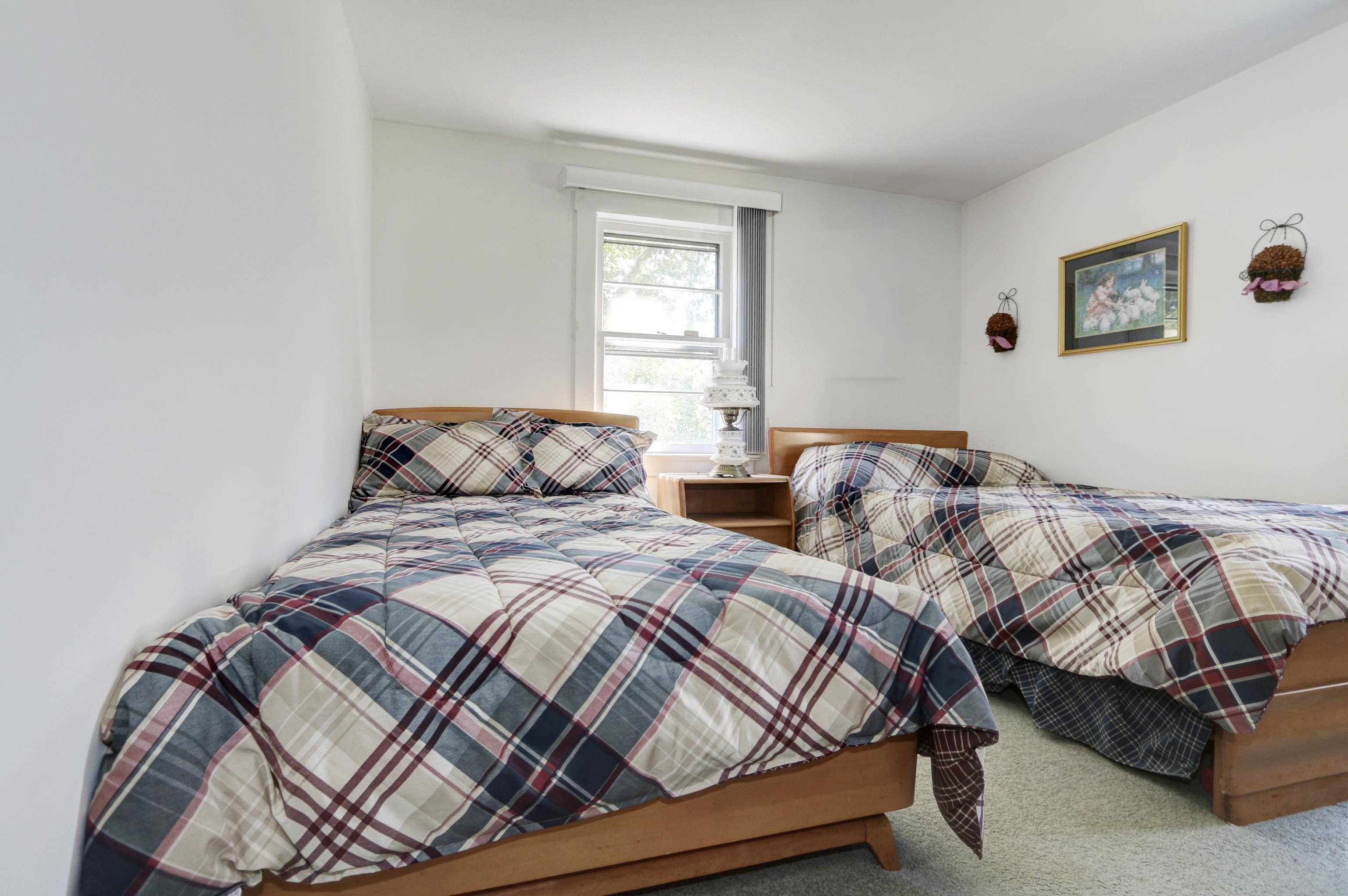 12 West Cedar Avenue Rio Grande, NJ 08242 - Photo 19 of 40 a bedroom with two beds and a window