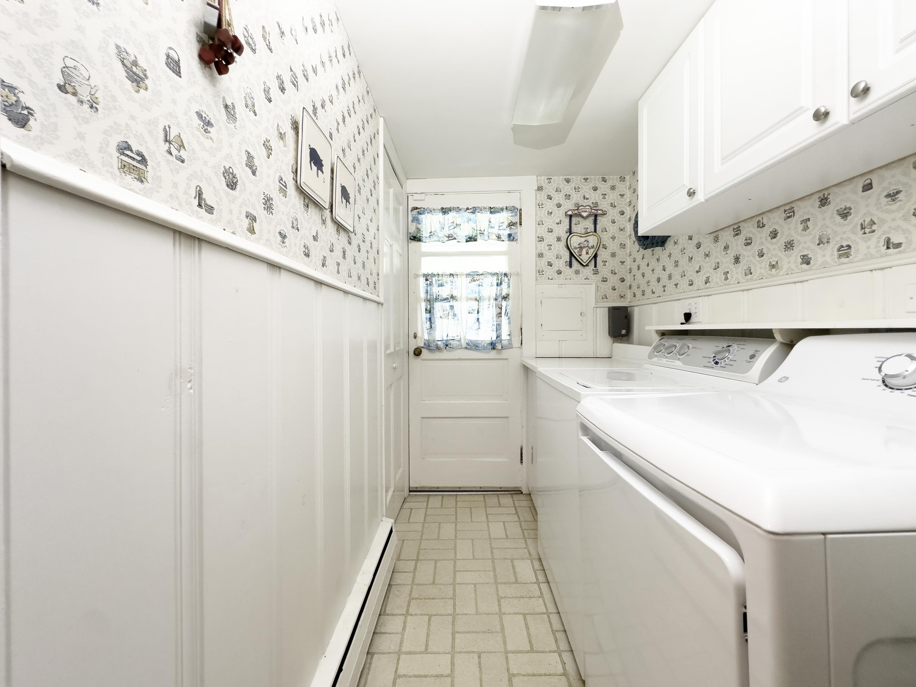 12 West Cedar Avenue Rio Grande, NJ 08242 - Photo 23 of 40 a utility room with cabinets washer and dryer