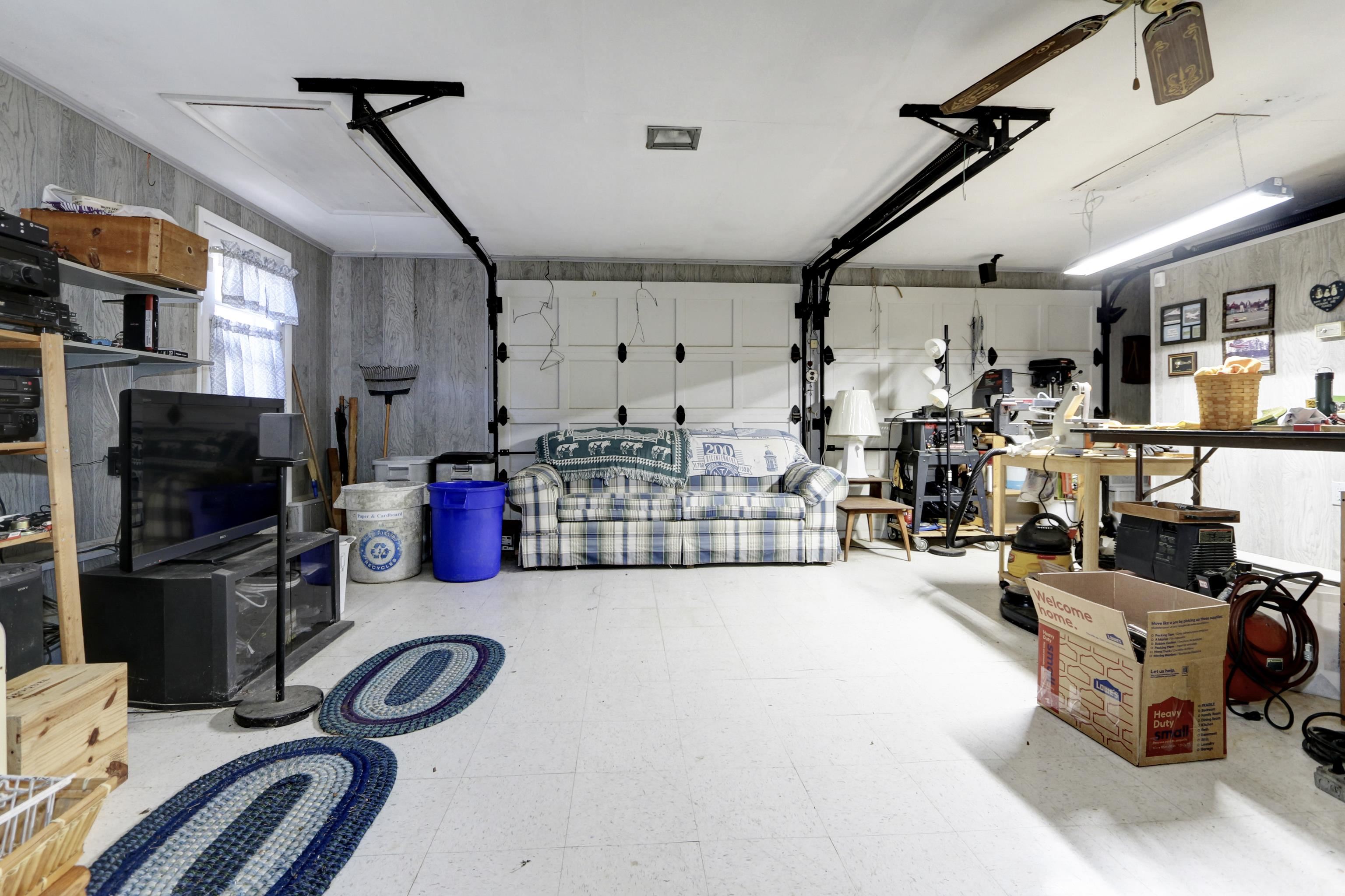 12 West Cedar Avenue Rio Grande, NJ 08242 - Photo 27 of 40 a living room with lots of furniture and a flat screen tv