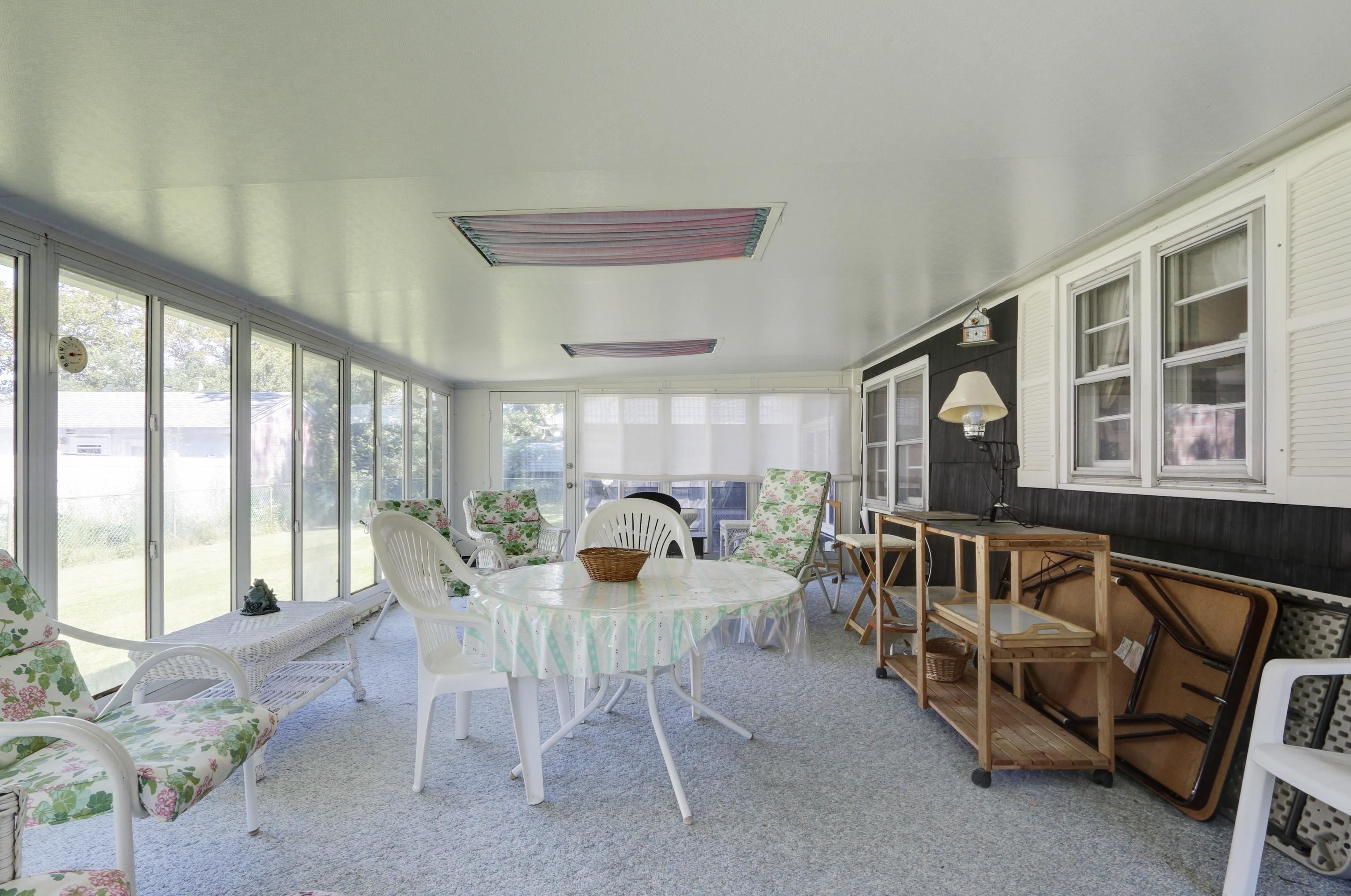 12 West Cedar Avenue Rio Grande, NJ 08242 - Photo 30 of 40 a dining room with furniture and a large window