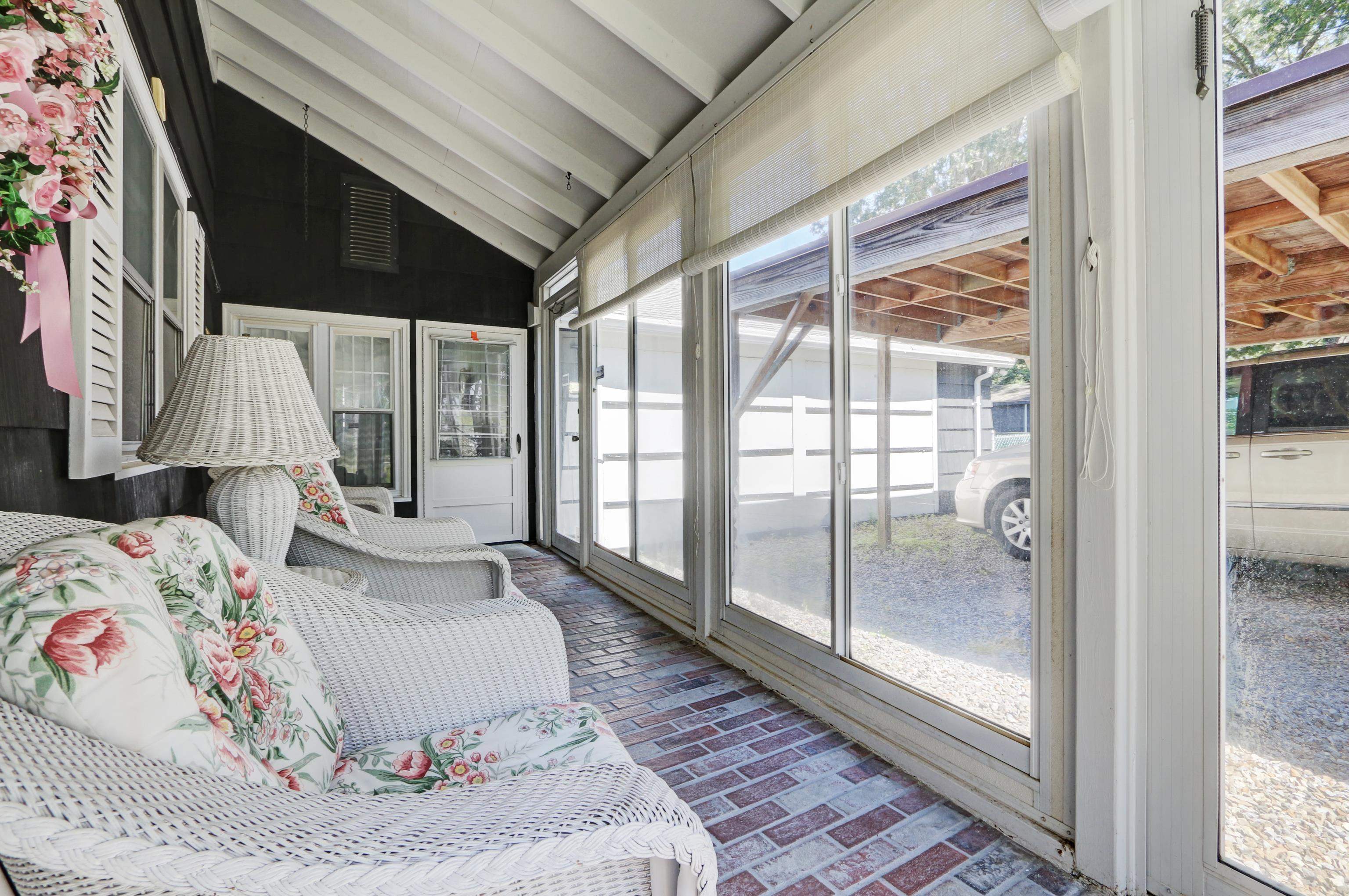 12 West Cedar Avenue Rio Grande, NJ 08242 - Photo 3 of 40 a bed sitting in a bedroom next to a window