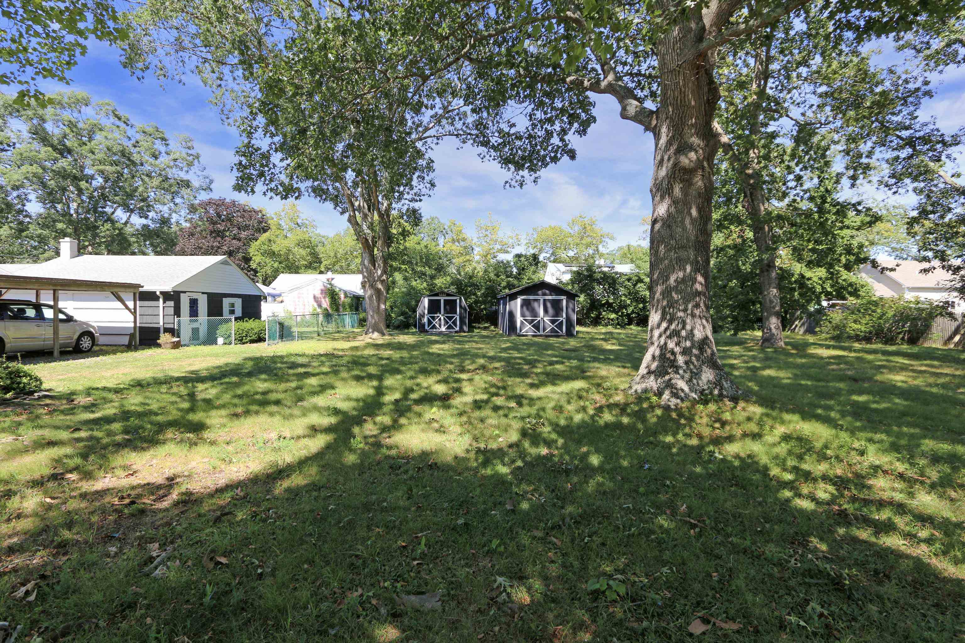 12 West Cedar Avenue Rio Grande, NJ 08242 - Photo 37 of 40 a view of an house with backyard space and sitting area