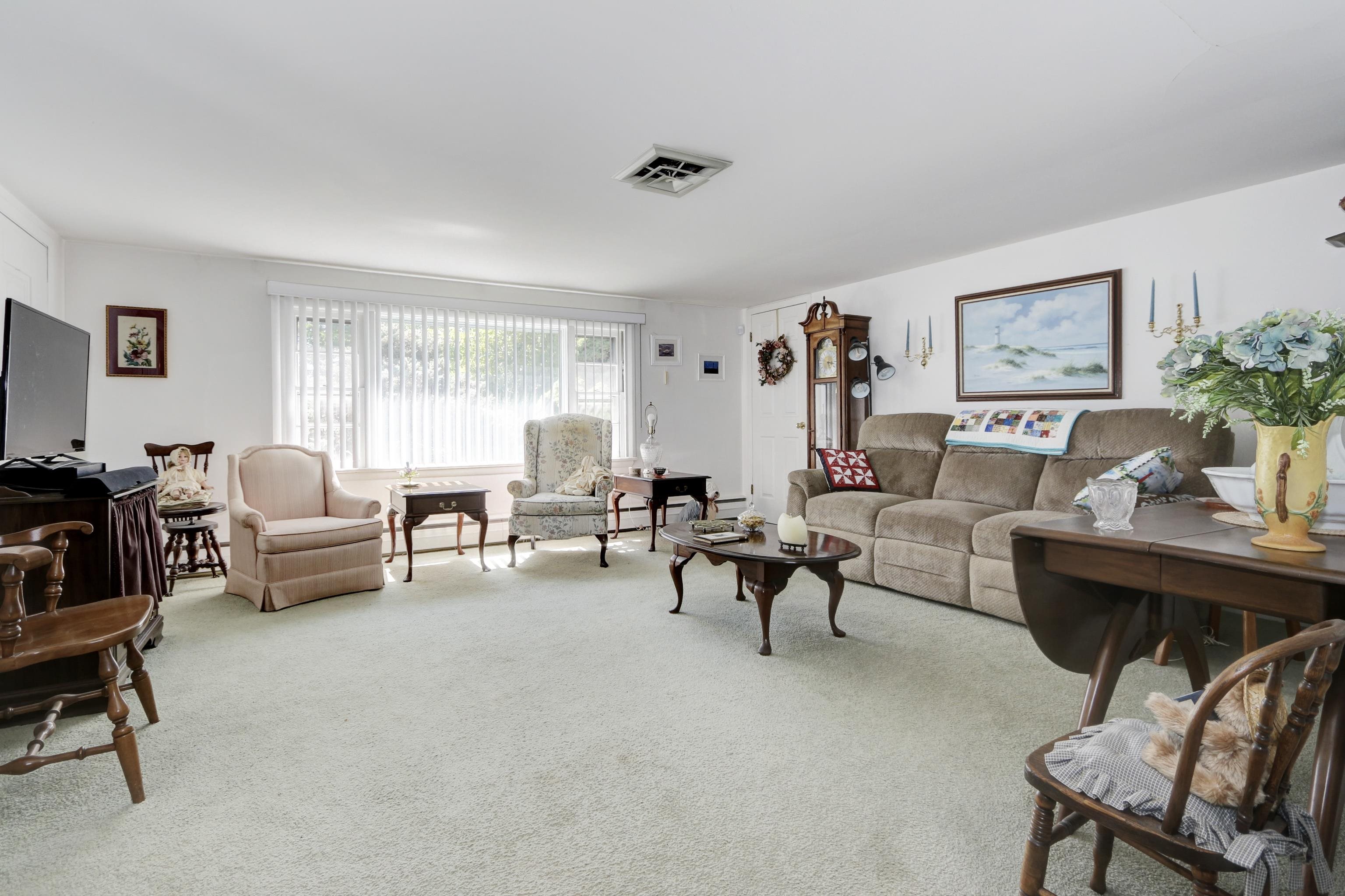 12 West Cedar Avenue Rio Grande, NJ 08242 - Photo 4 of 40 a living room with furniture and a large window
