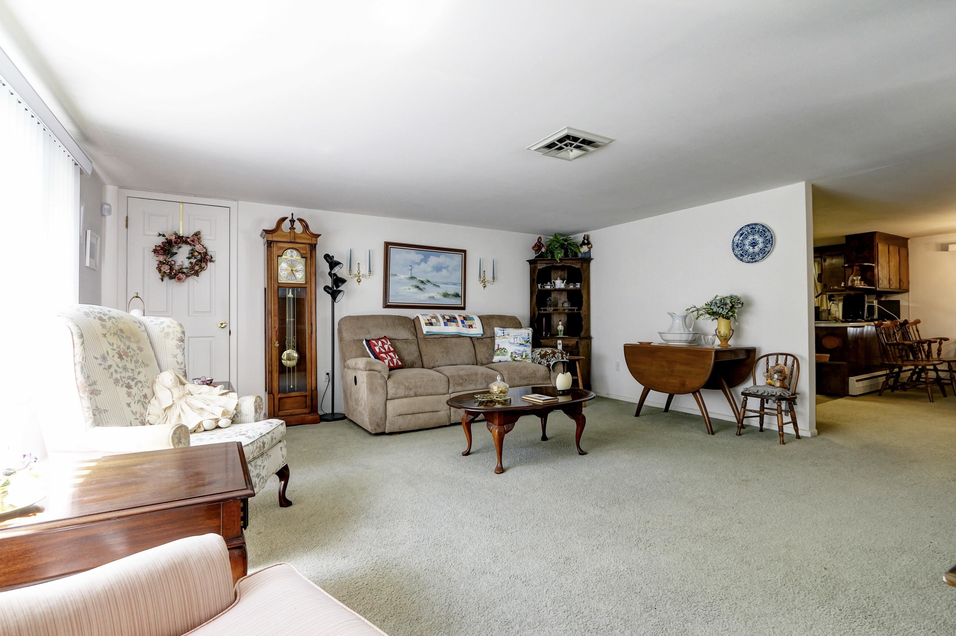 12 West Cedar Avenue Rio Grande, NJ 08242 - Photo 7 of 40 a living room with furniture and a table