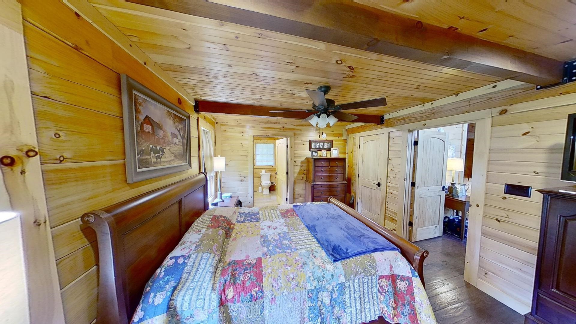 2591 Rue Hammer Road Cedar Grove, TN 38321 - Photo 12 of 27 a bed room with a bed
