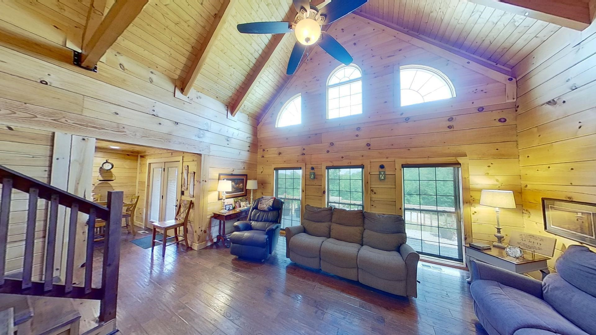 2591 Rue Hammer Road Cedar Grove, TN 38321 - Photo 7 of 27 a living room with furniture and wooden floor