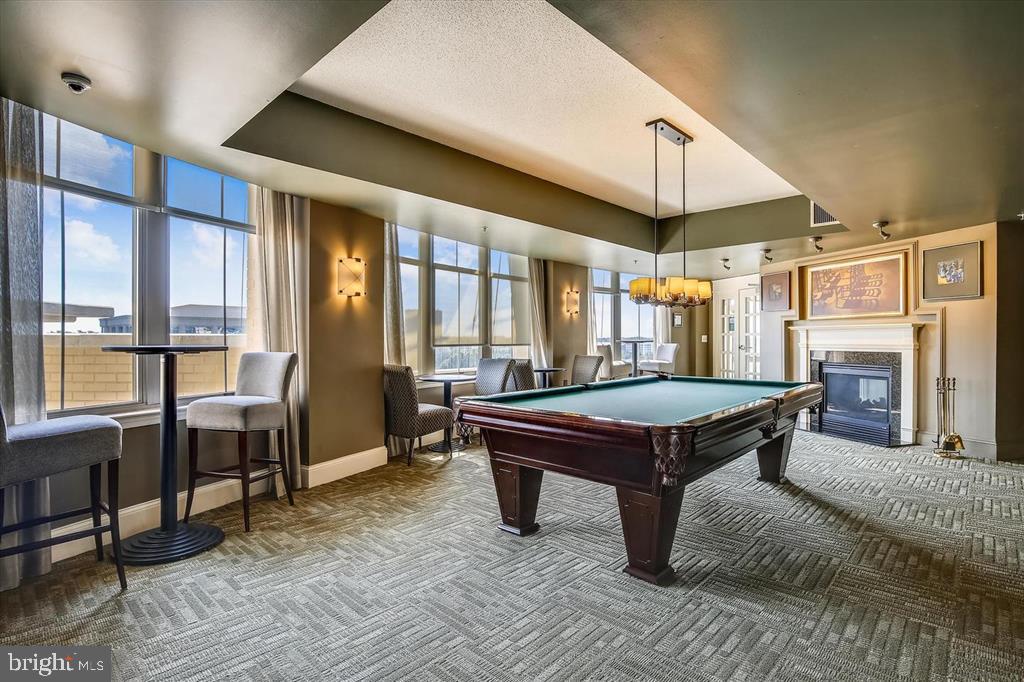 11800 Sunset Hills Road, Unit 815 Reston, VA 20190 - Photo 42 of 61 Billiard Room w gas FP + panoramic views from 13th