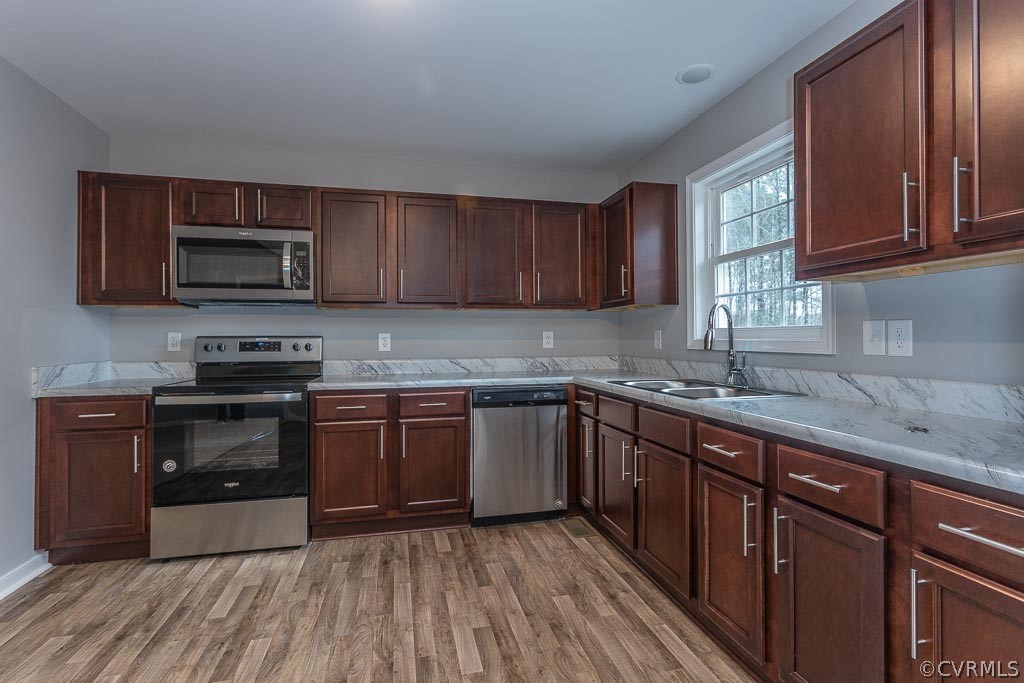 Lot 5 Railroad Bed Road Carson, VA 23830 - Photo 8 of 31 a kitchen with granite countertop wooden cabinets and a stove top oven