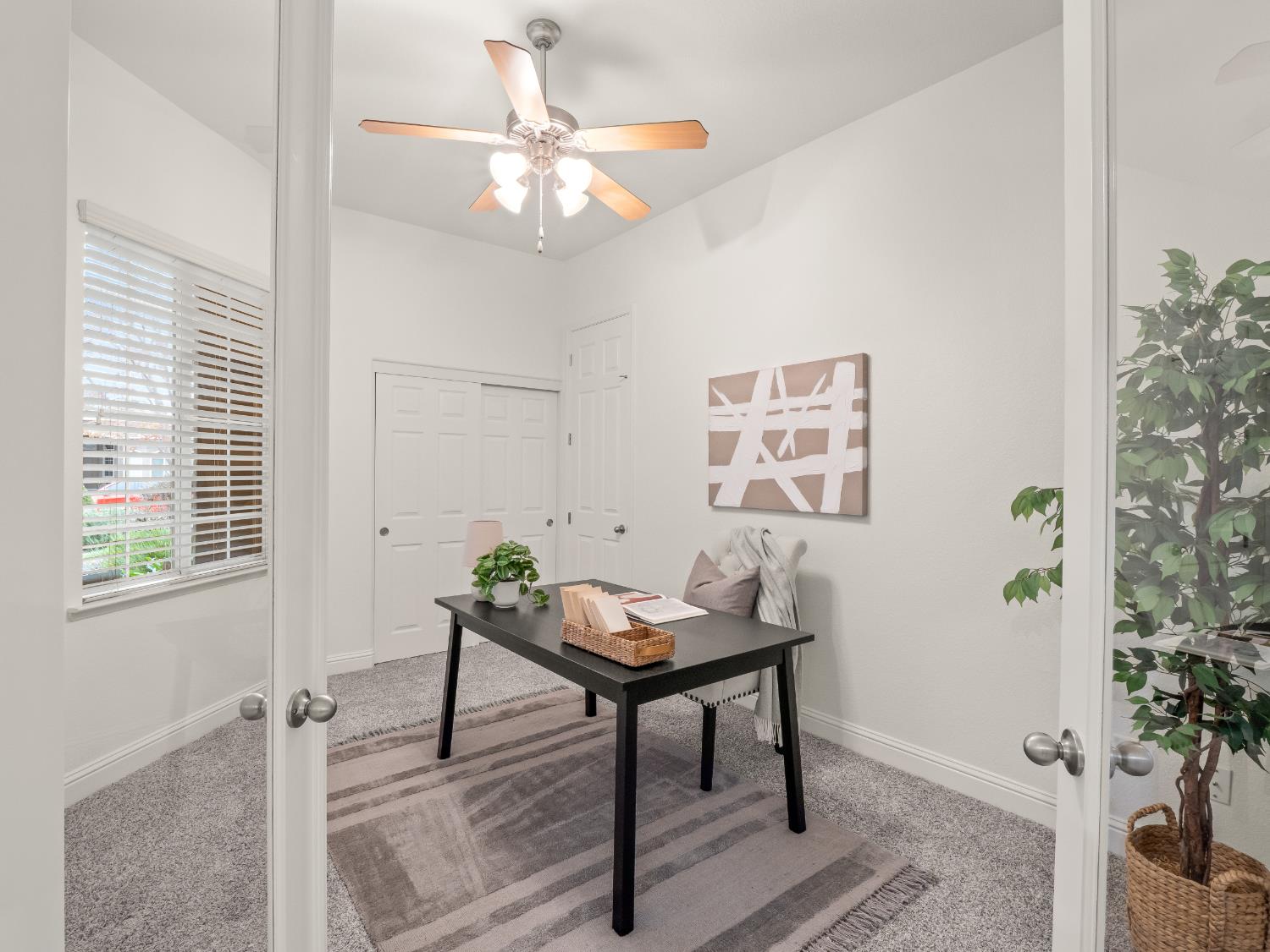 8683 North Richelle Avenue Fresno, CA 93720 - Photo 3 of 44 a living room with furniture and a potted plant
