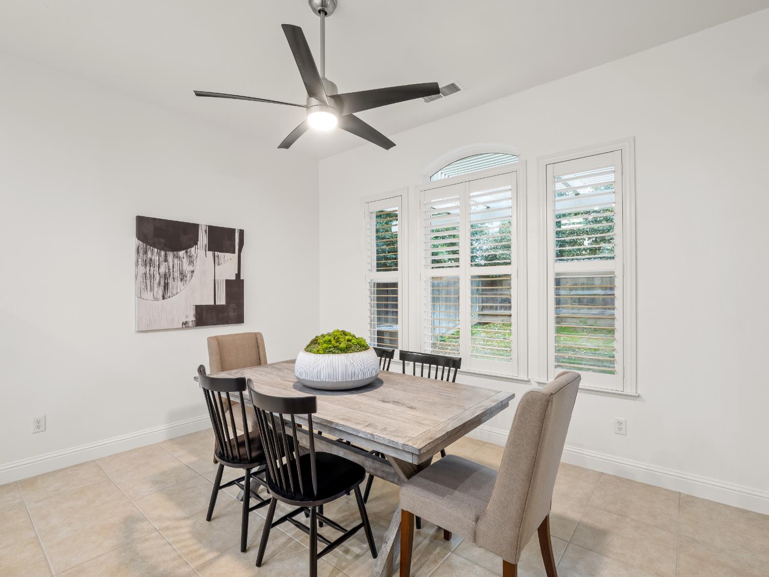 8683 North Richelle Avenue Fresno, CA 93720 - Photo 8 of 44 a view of a dining room with furniture window and outside view