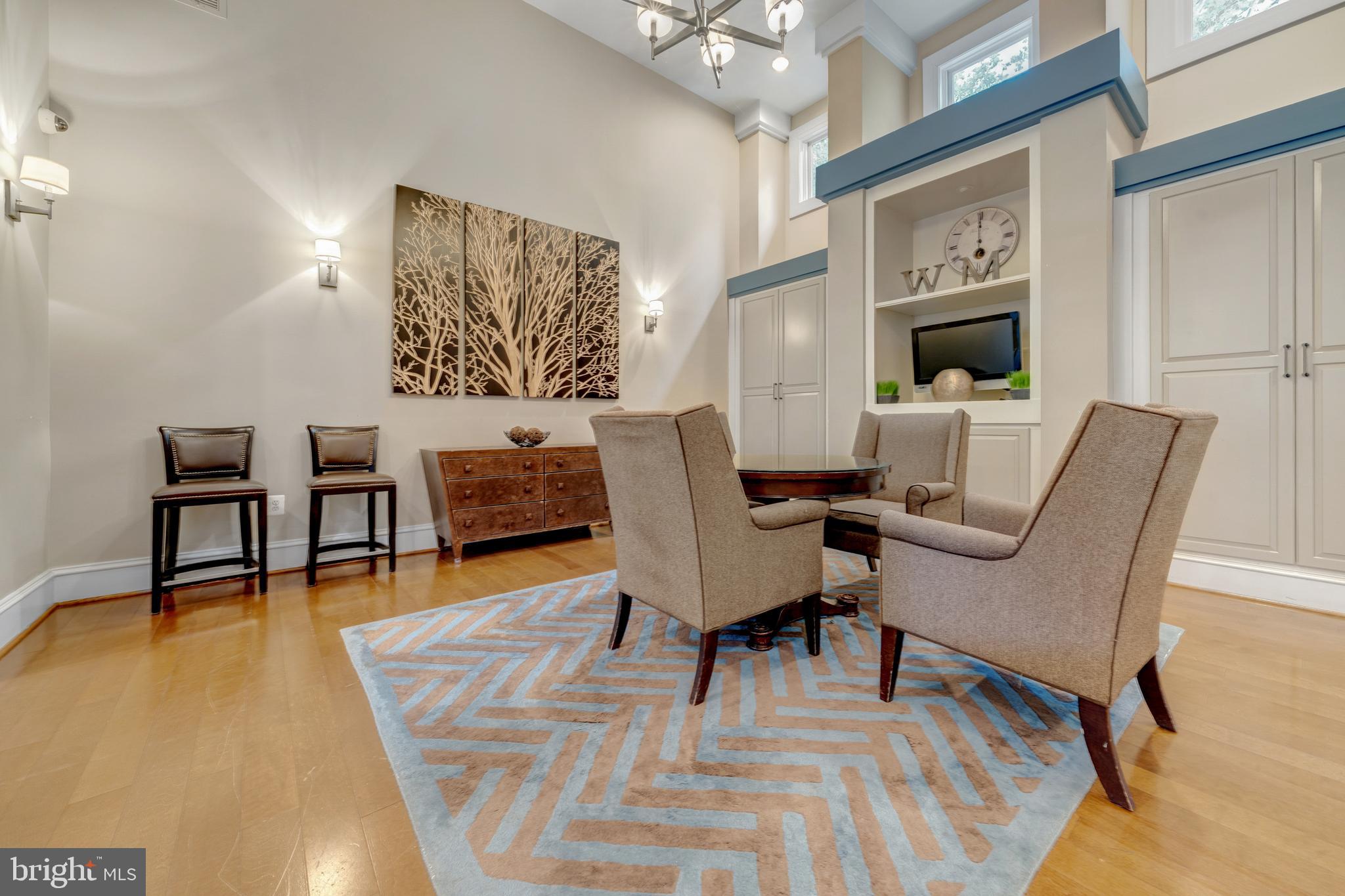1925 Logan Manor Drive Reston, VA 20190 - Photo 52 of 61 a living room with furniture and a fireplace