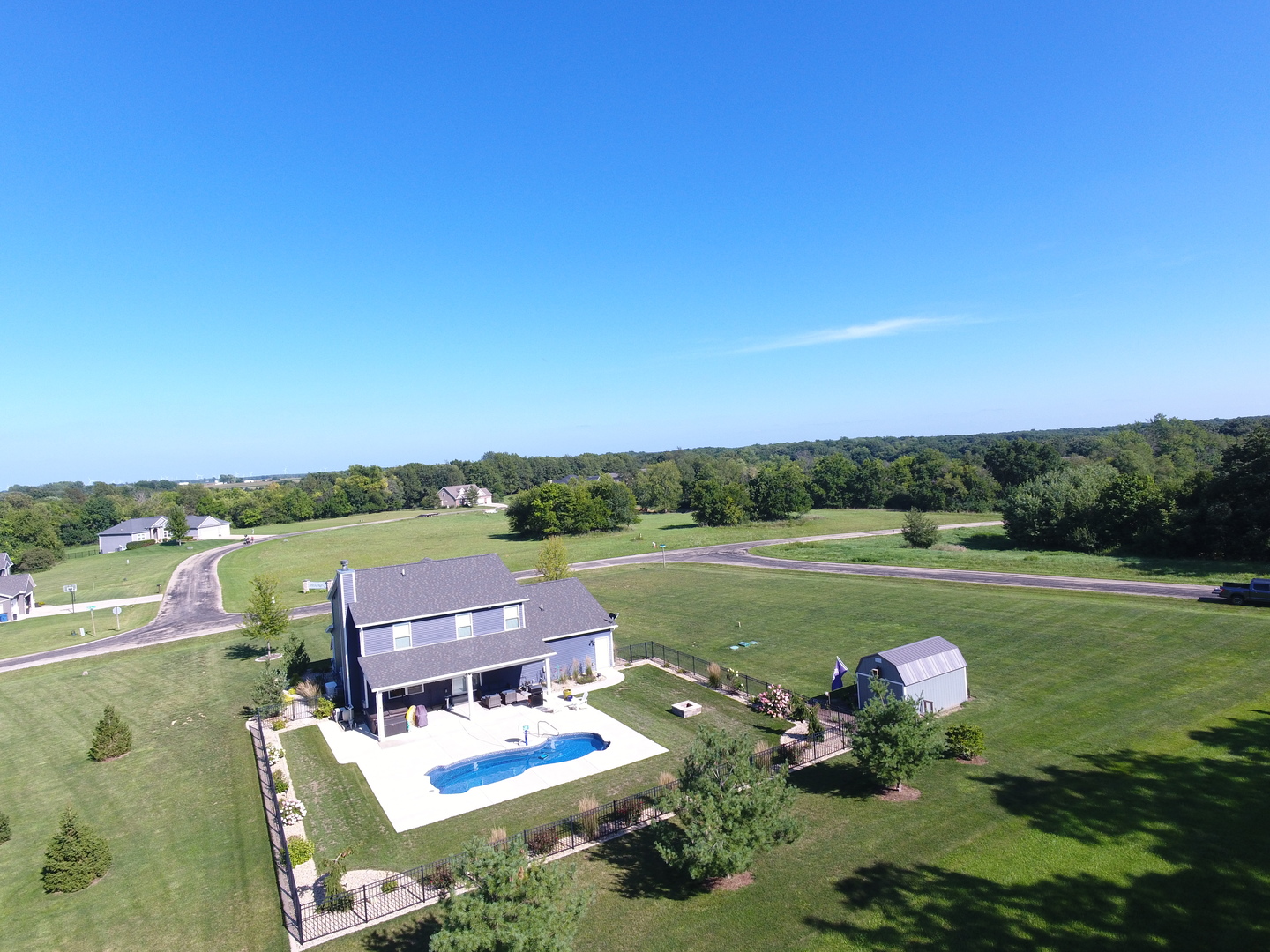 13 Wolf Run Road El Paso, IL 61738 - Photo 11 of 57 a view of a lake with couches and city view