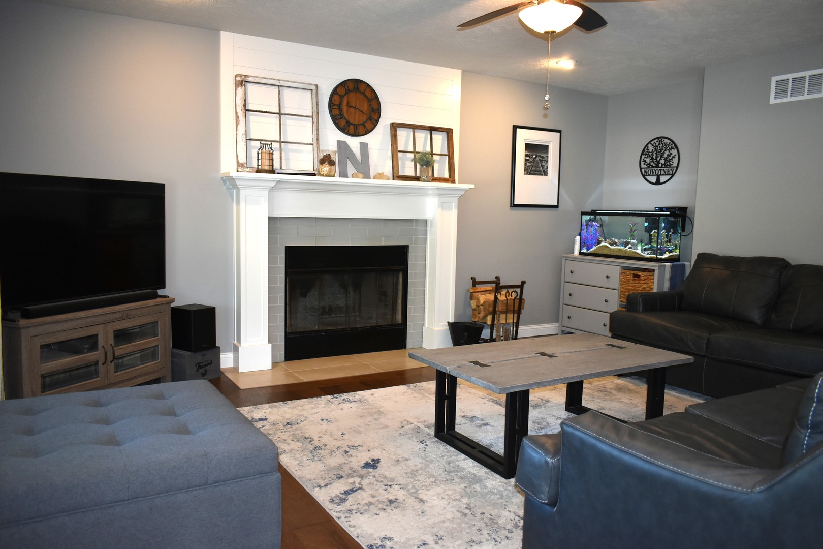 13 Wolf Run Road El Paso, IL 61738 - Photo 16 of 57 a living room with furniture and a flat screen tv