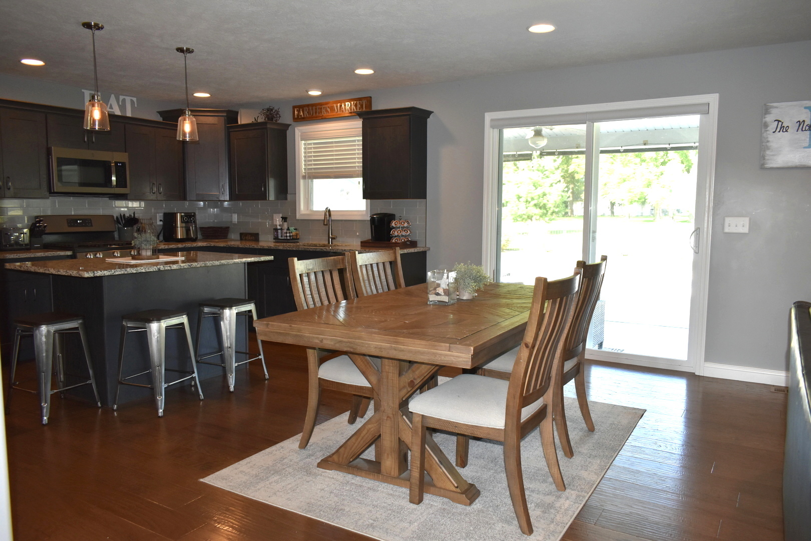 13 Wolf Run Road El Paso, IL 61738 - Photo 24 of 57 a dining room with furniture and wooden floor