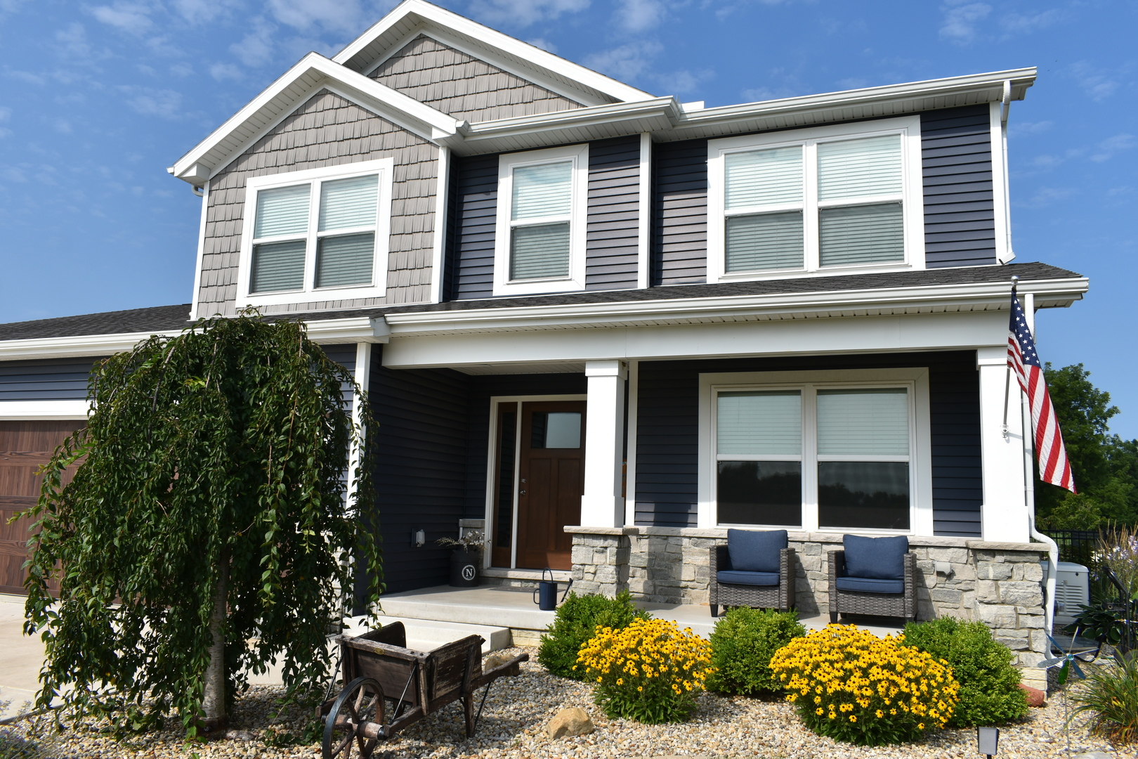13 Wolf Run Road El Paso, IL 61738 - Photo 3 of 57 a view of a house with sitting area and garden