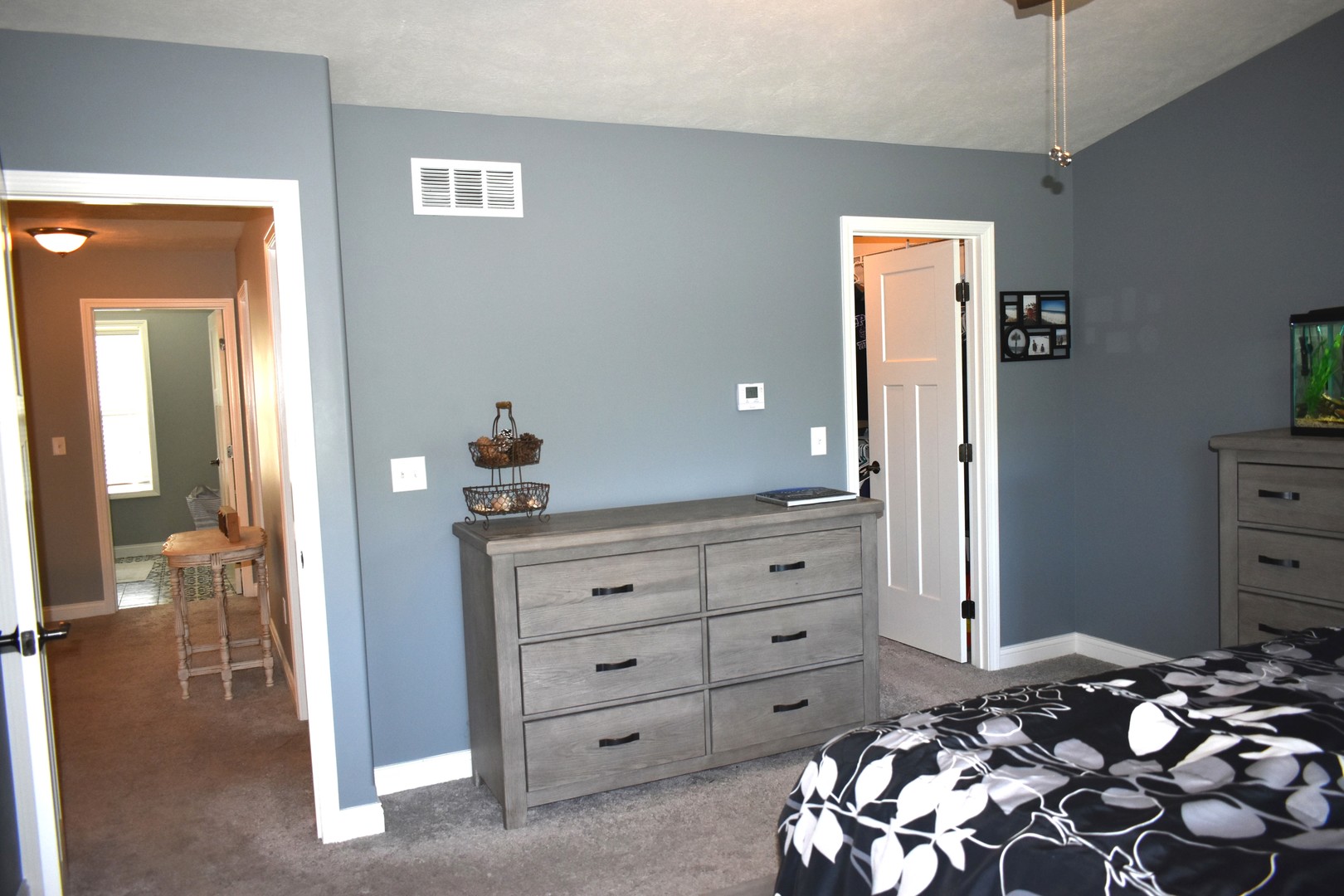 13 Wolf Run Road El Paso, IL 61738 - Photo 34 of 57 a bedroom with a bed and a dresser