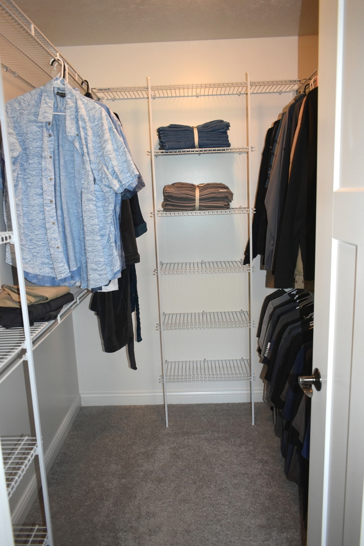 13 Wolf Run Road El Paso, IL 61738 - Photo 35 of 57 a view of walk in closet with clothes and shoes