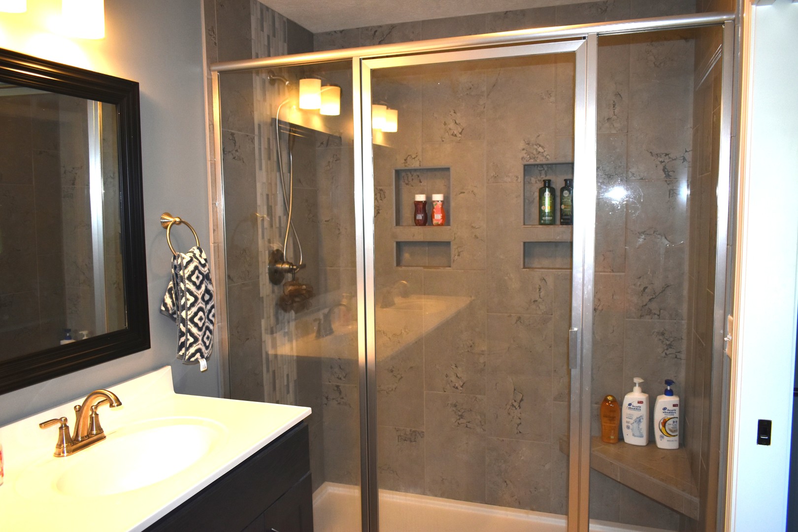 13 Wolf Run Road El Paso, IL 61738 - Photo 37 of 57 a bathroom with a sink and mirror